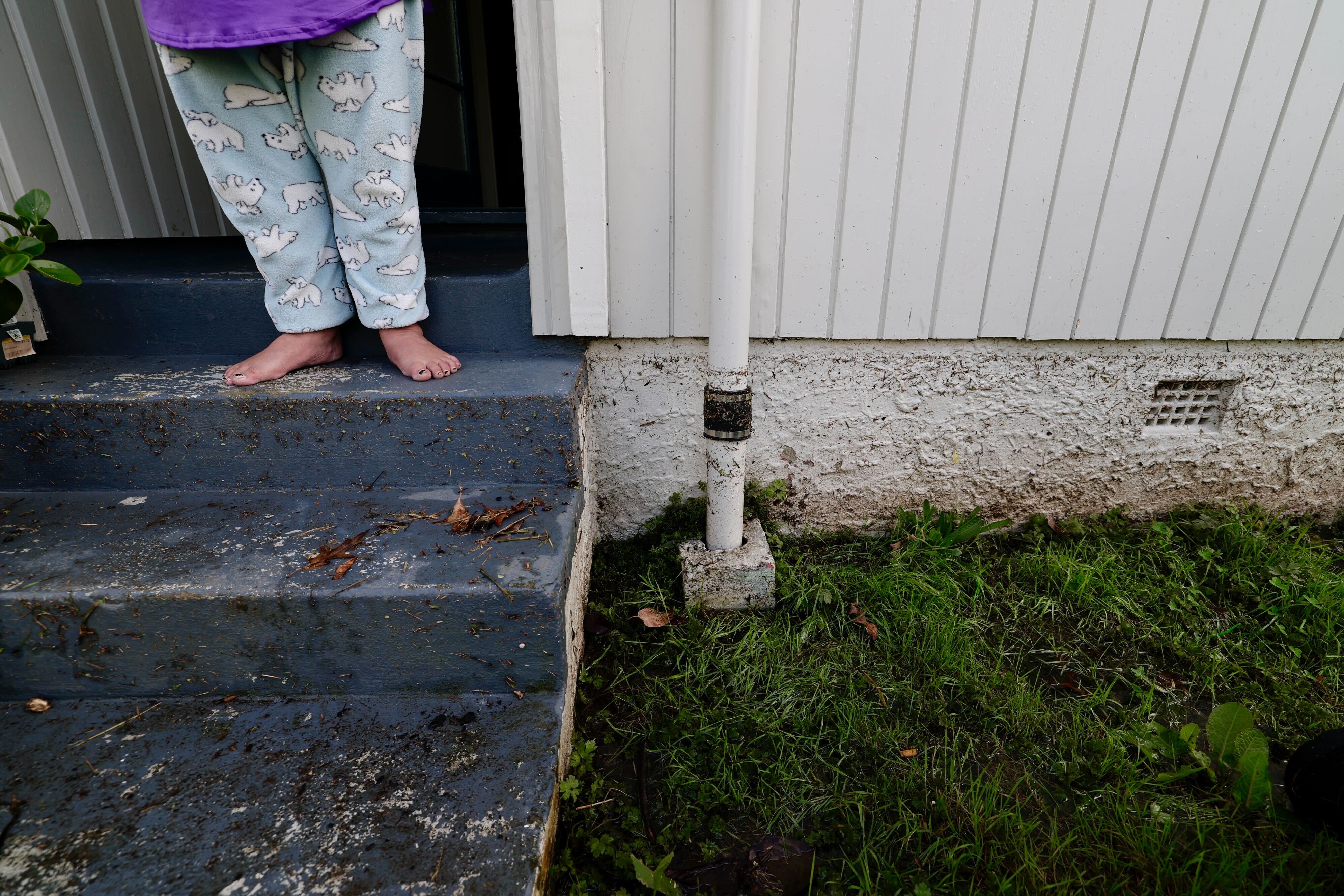 Public housing tenant Chrissy's home on Denny Ave was almost flooded again overnight. Photo / Dean Purcell