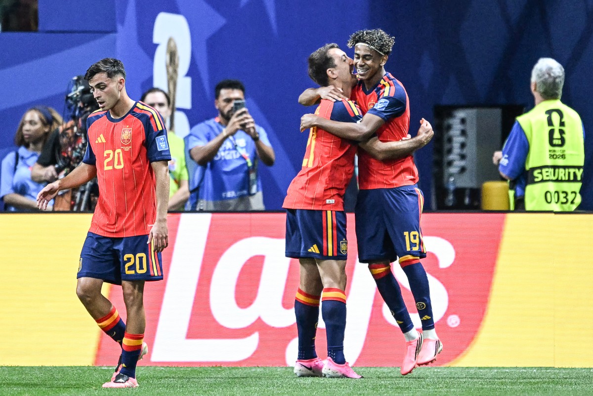 Spain's forward Lamine Yamal celebrates with teammates after scoring the opening goal against Saudi Arabia during the 2026 Fifa World Cup group game. Photo / AFP