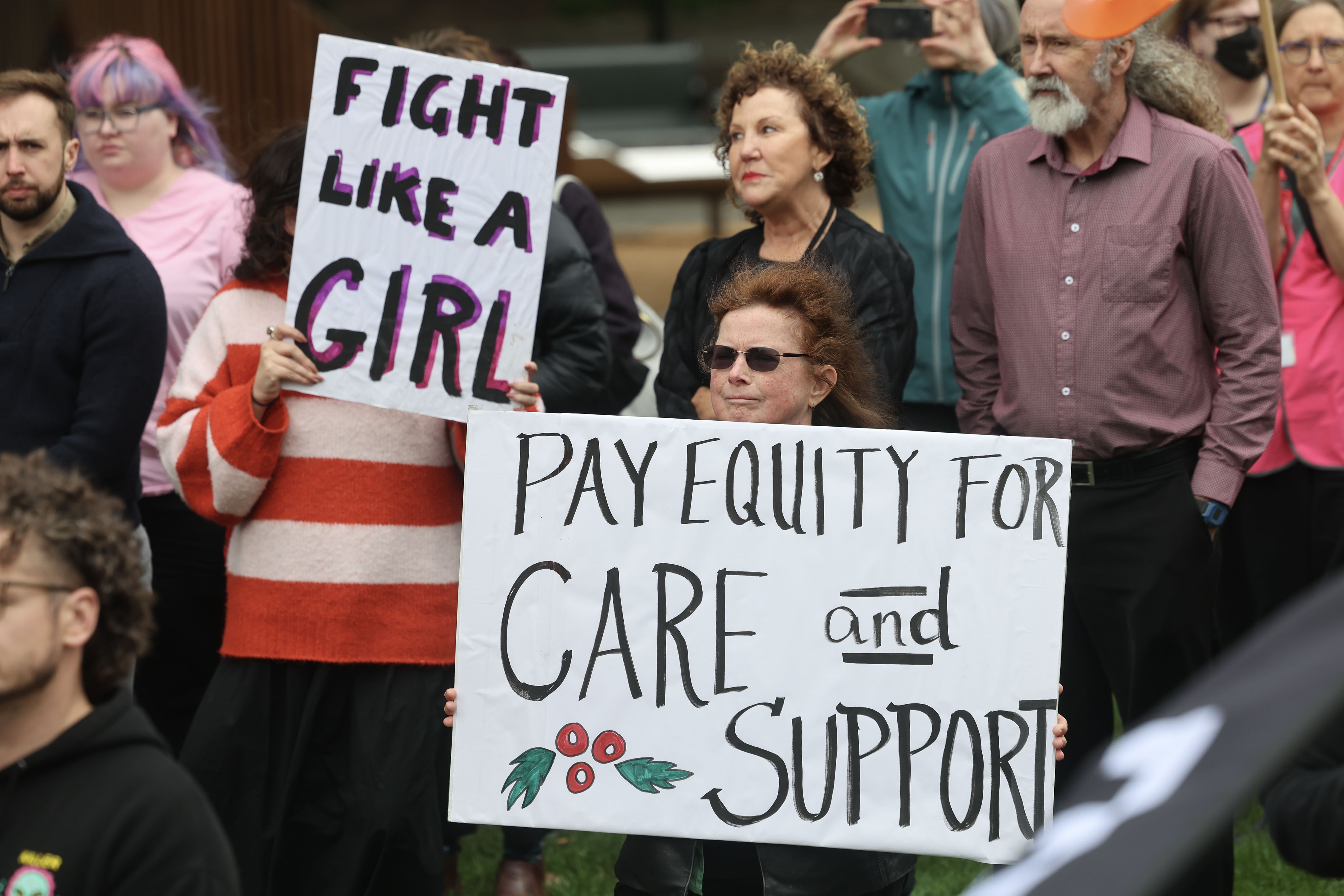 Protesters voice their concerns outside Parliament this week after the Government’s pay equity announcement, and more campaign action is planned for Friday. Photo / Marty Melville
