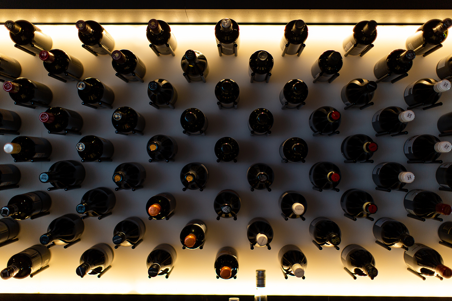 A towering rack of wine stretches around the room. Photo / Babiche Martens