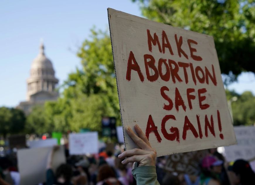 Demonstrators march and gather near the state capitol following the Supreme Court's decision to overturn Roe v Wade in June. Photo / AP
