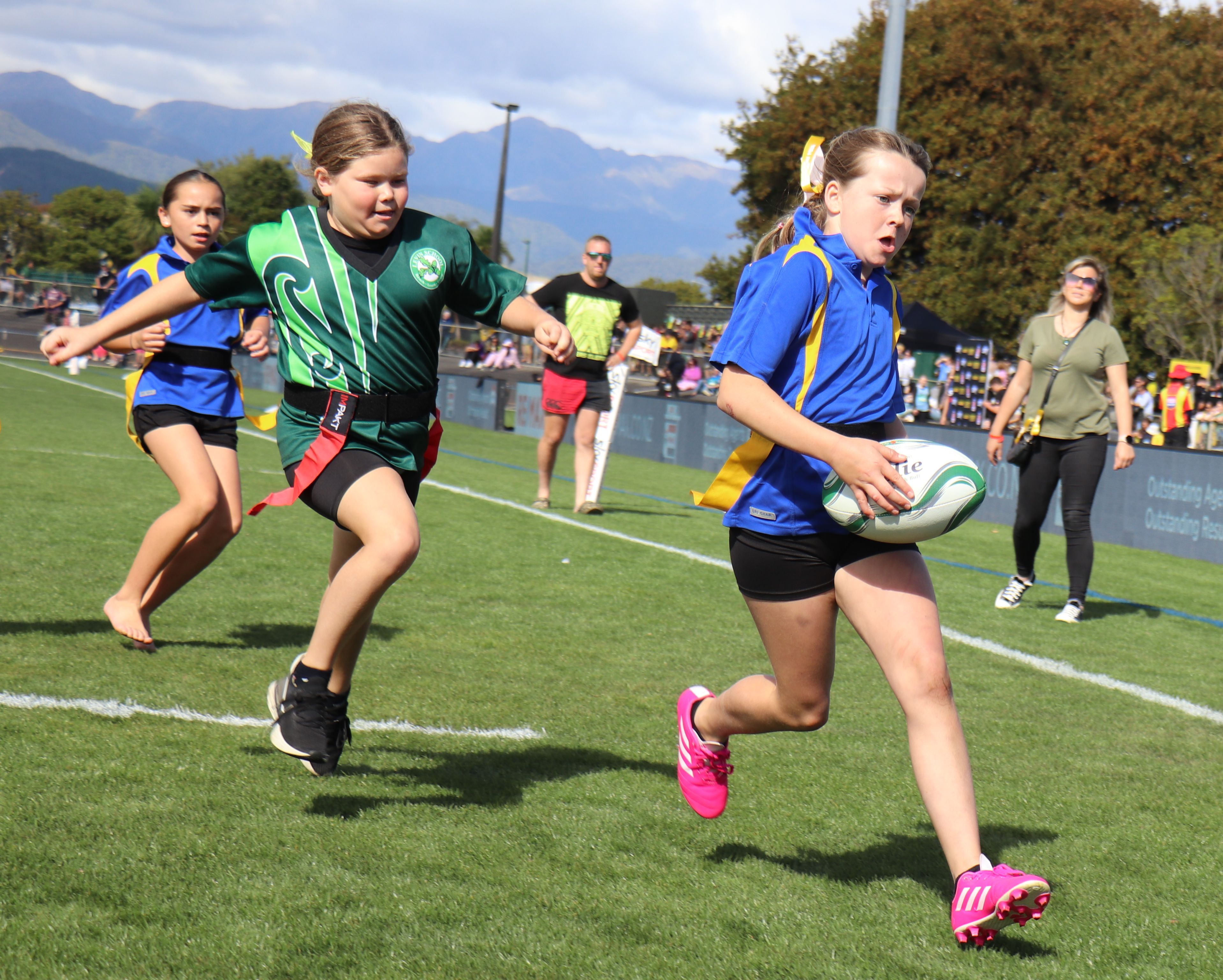 Milla Robinson from Coley Street School scores a try against Levin School during halftime of the Super Aupiki match at Levin Domain.