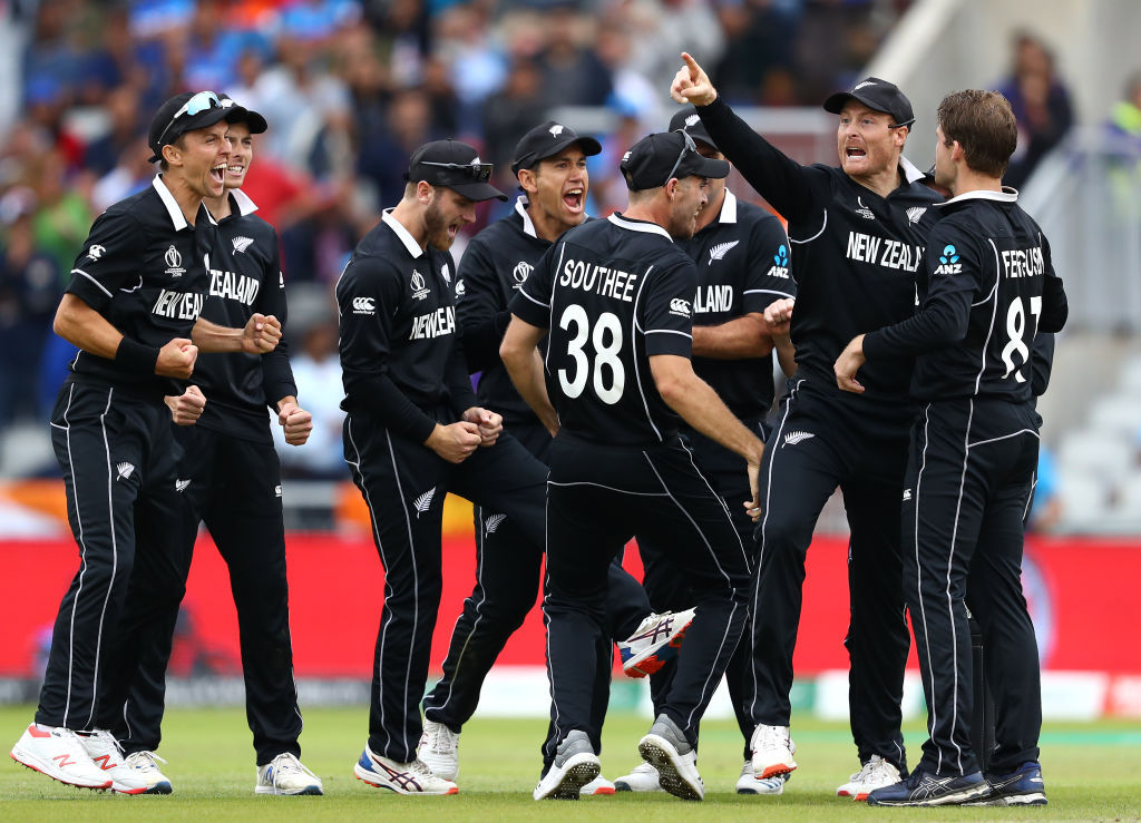Martin Guptill celebrates running out MS Dhoni. Photo / Getty