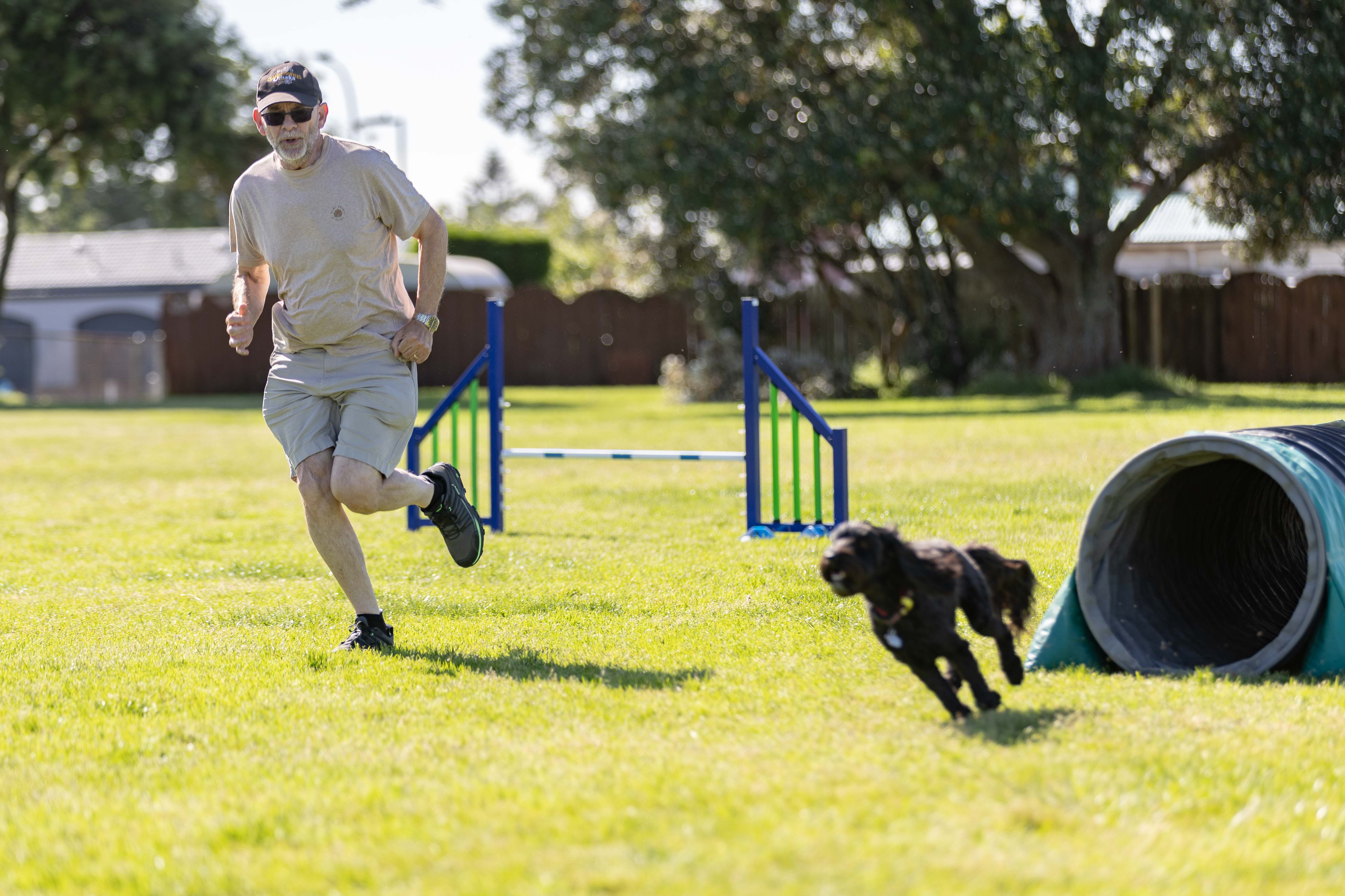 The Mount Maunganui Dog Training Club is being pushed out by the council from its Links Ave Reserve grounds. Pictured is club committee member David Swinyard and his dog, Lizzie. Photo / Alex Cairns