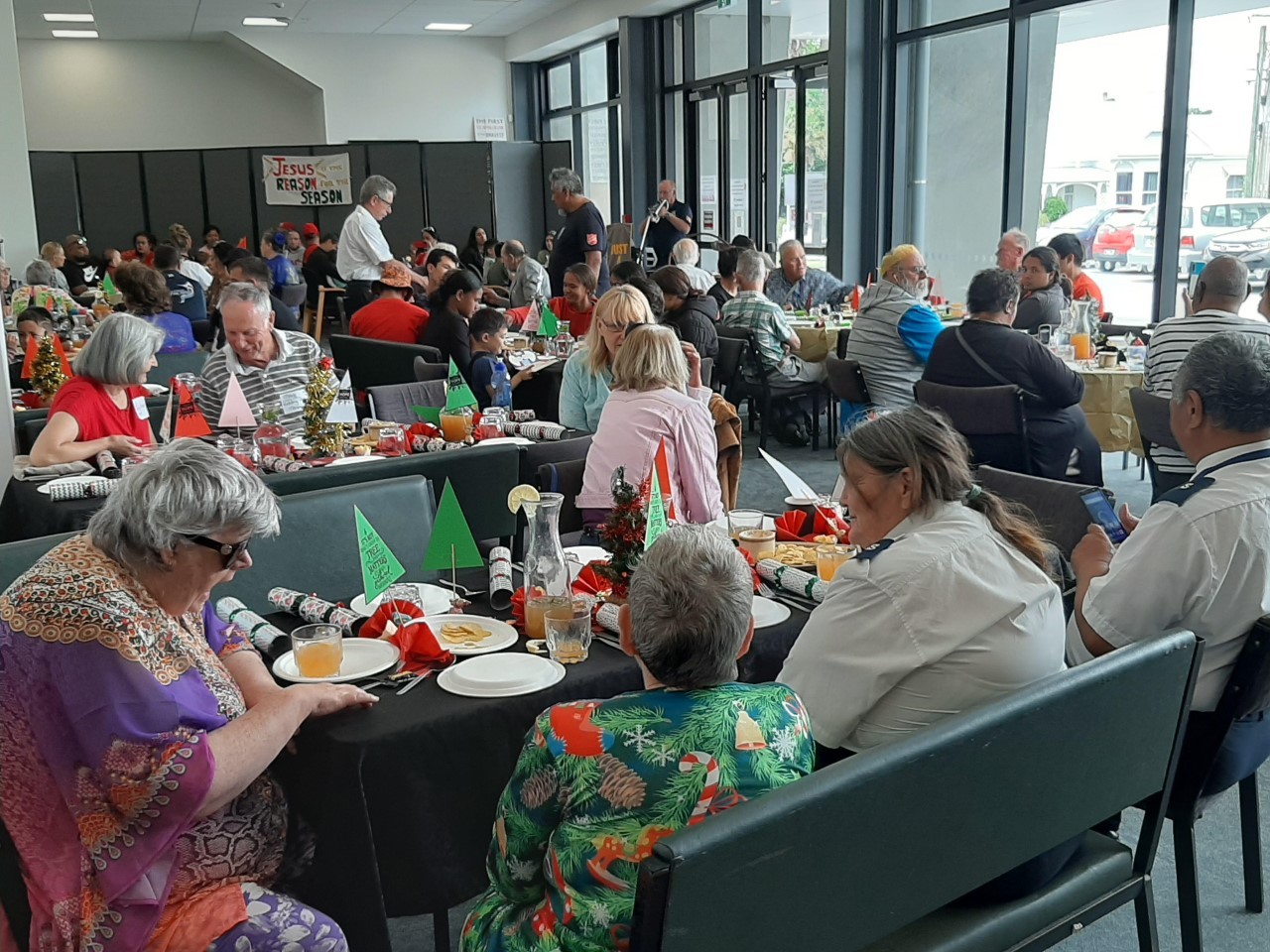 Families get into the Christmas spirit during the annual lunch organised by the Whangārei Salvation Army.
Photo / Imran Ali