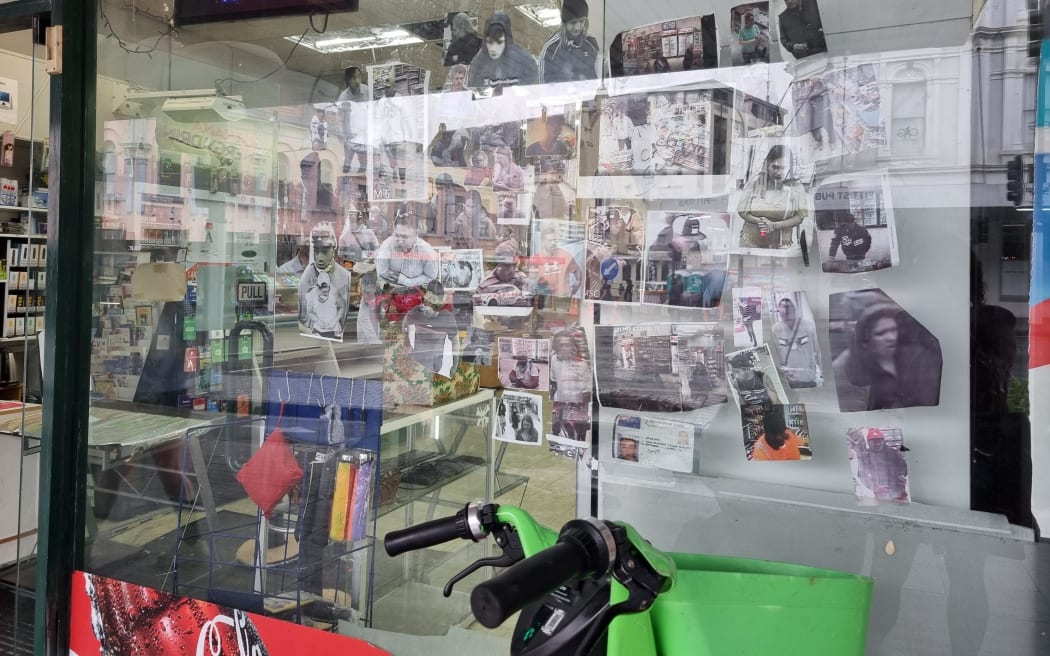 In the front of Haytham Akil's shop, he has put up dozens of pictures of people caught on CCTV stealing. Photo / RNZ