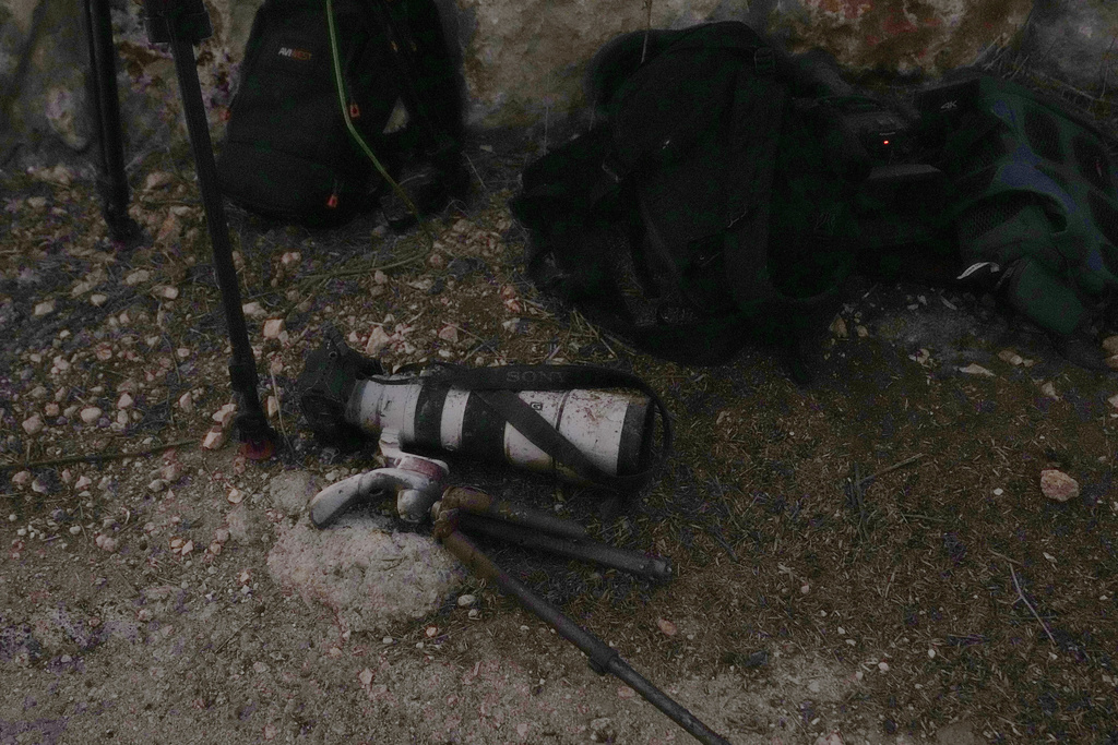 The camera of a photographer who was injured by Israeli shelling, is left on the ground at the Alma al-Shaab border village with Israel, south Lebanon. Photo / AP