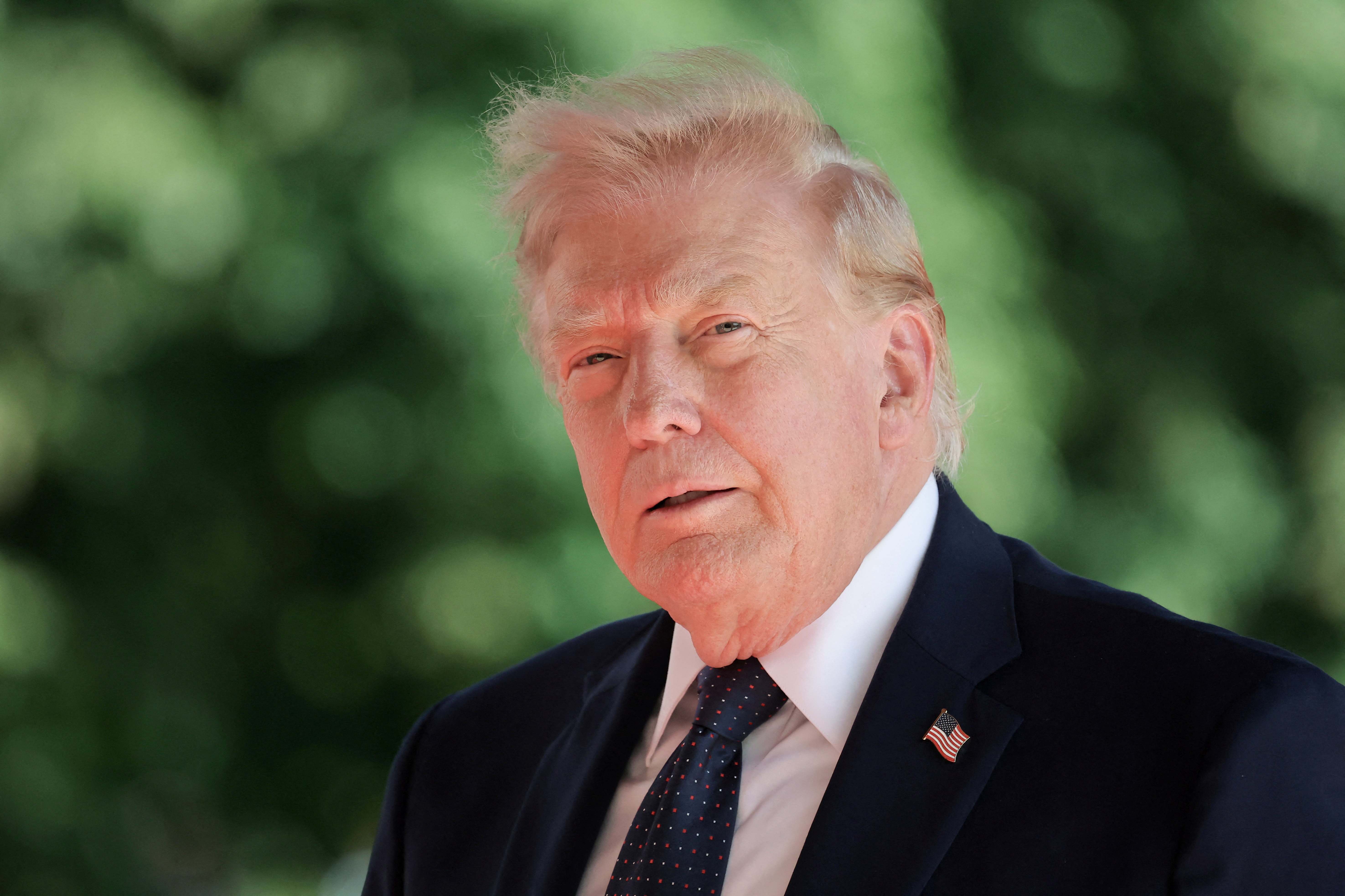 US President Donald Trump arrives for the G7 summit in Evian, eastern France in mid-June. Photo / AFP