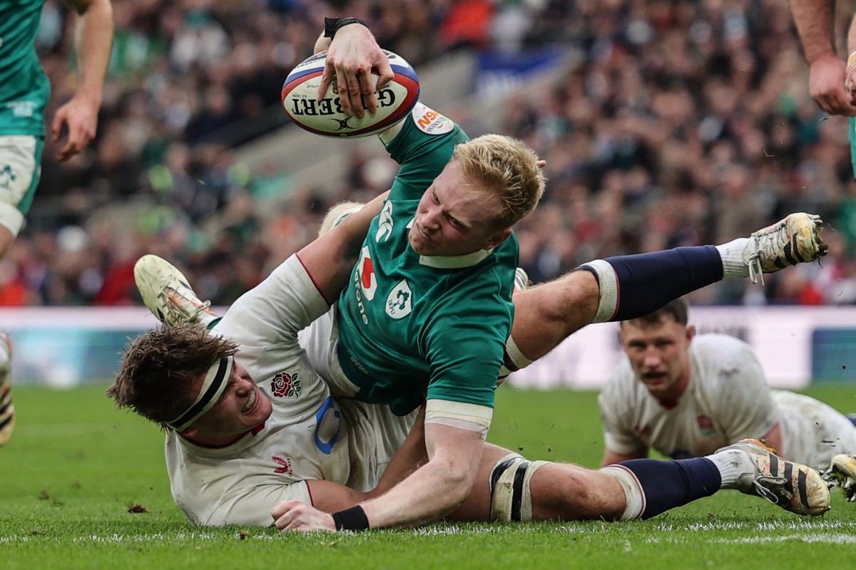 Ireland's full-back Jamie Osborne goes over the line to score a try during the Six Nations international rugby union match between England and Ireland at Allianz Stadium. Photo / AFP