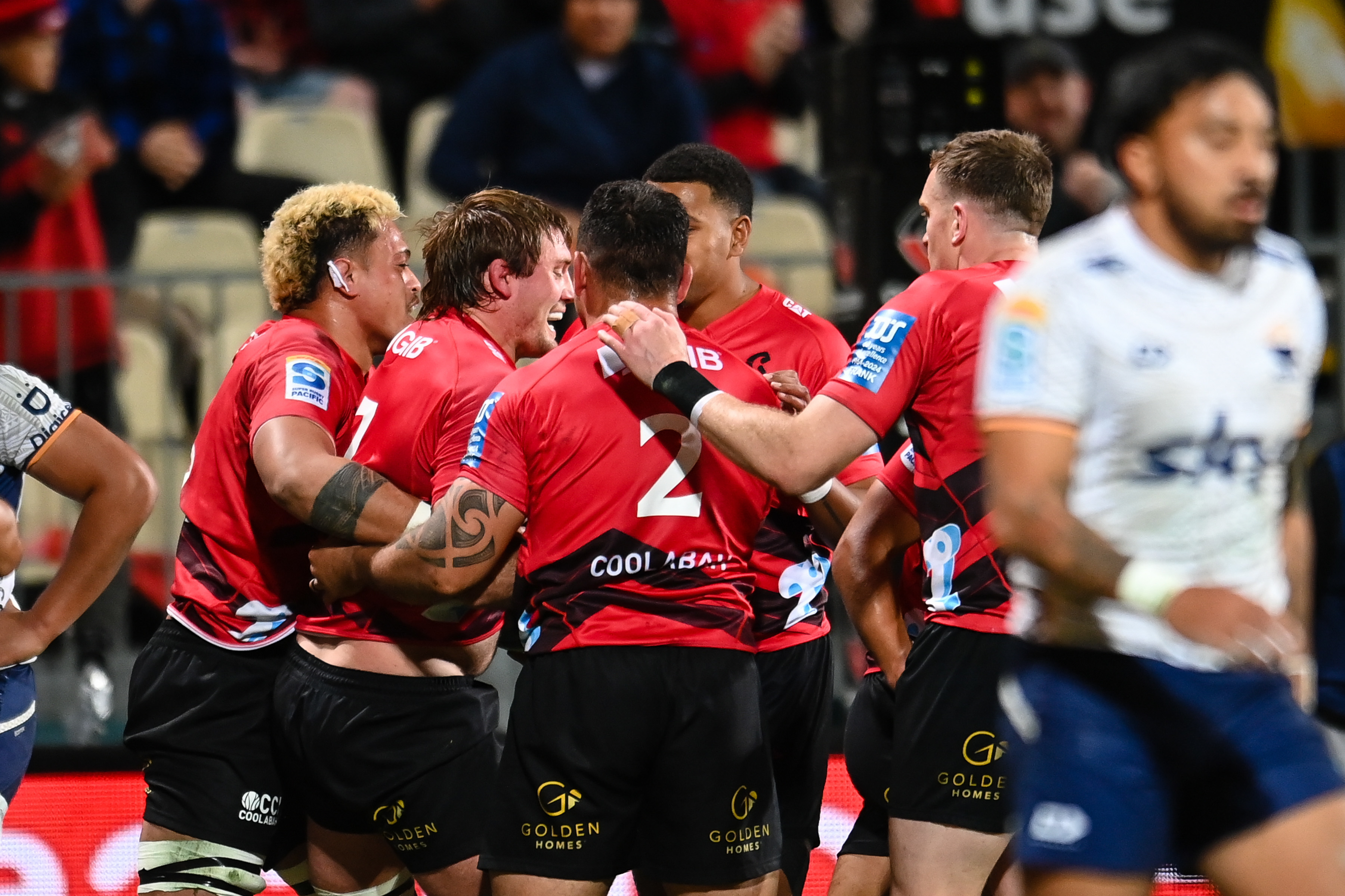 The Crusaders celebrate Ethan Blackadder's try against Moana Pasifika. Photo / Photosport