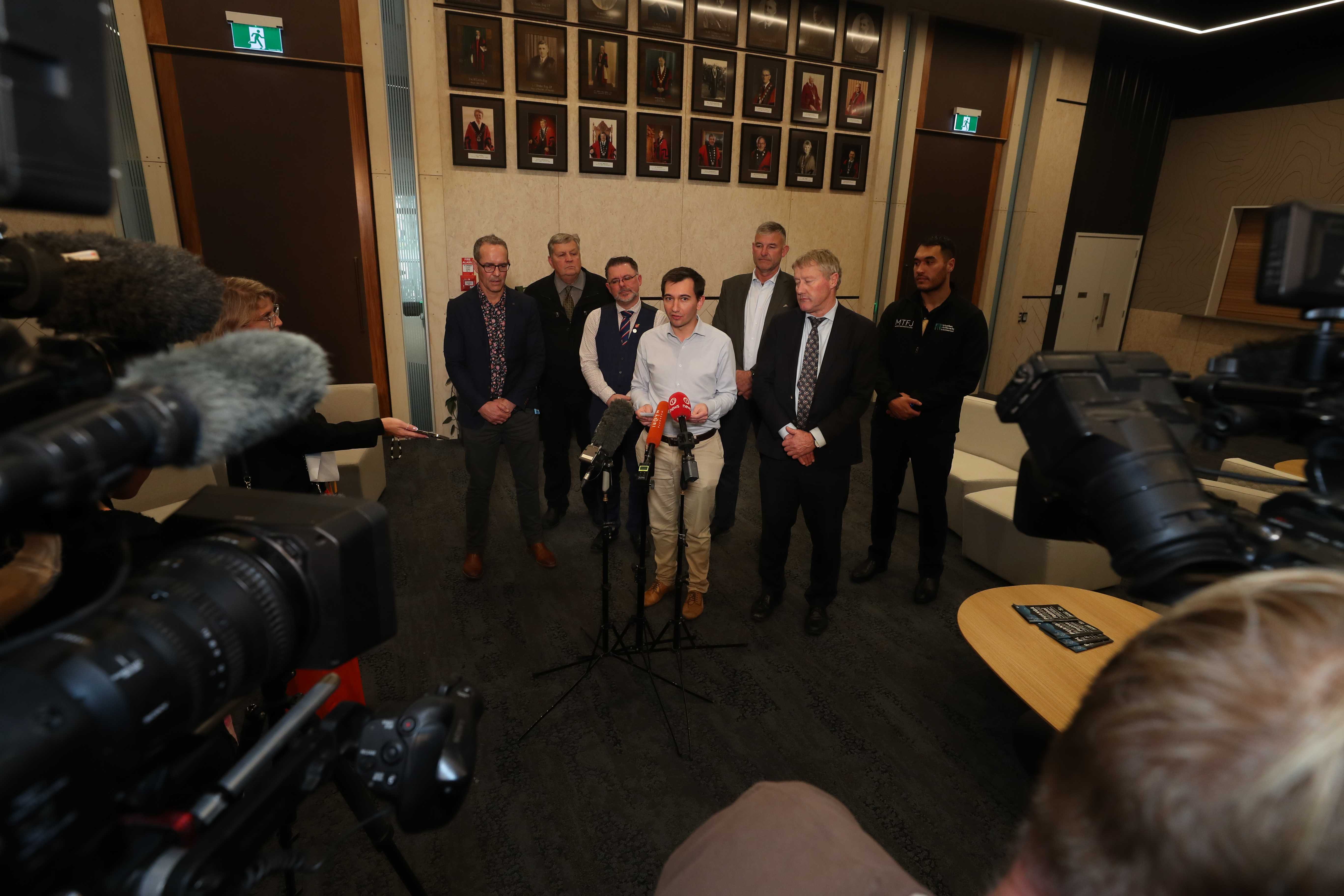 Energy Minister Simeon Brown, centre, and Northland mayors face the media to discuss the power cut that has affected the region. Photo/ Michael Cunningham.
