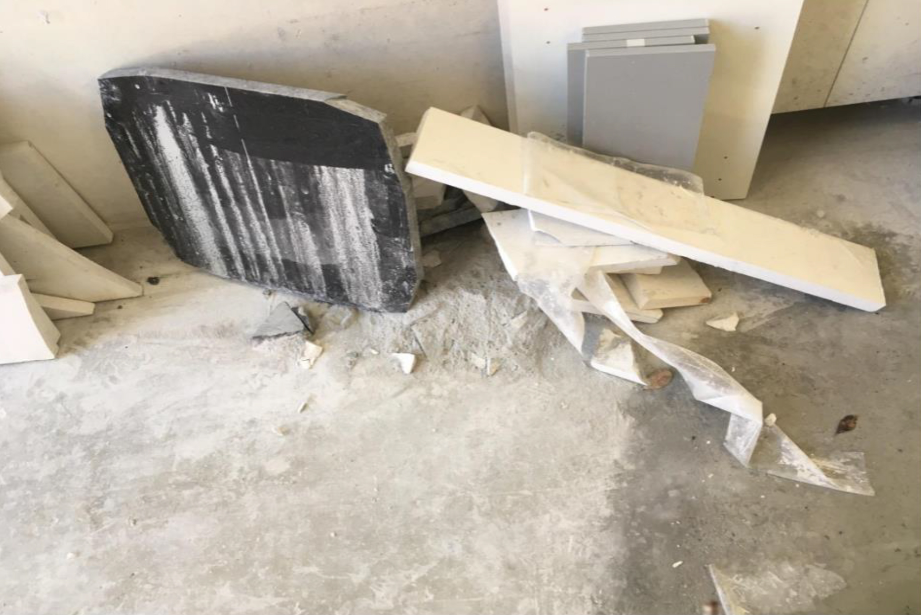 Dust covers the floor of a worksite, shut down after an inspection in August 2019.