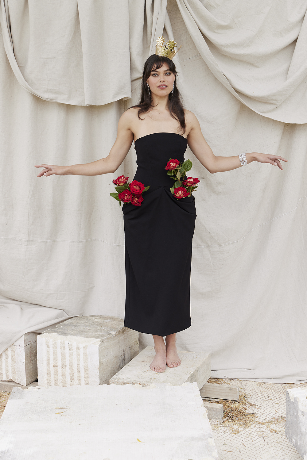 Karen wears Olivia Cashmore dress, $1129, from Simon James. Swarovski earrings $630 and bracelet $1000. Dresden crown, $9, from The Moonflowers. Photo / Mara Sommer