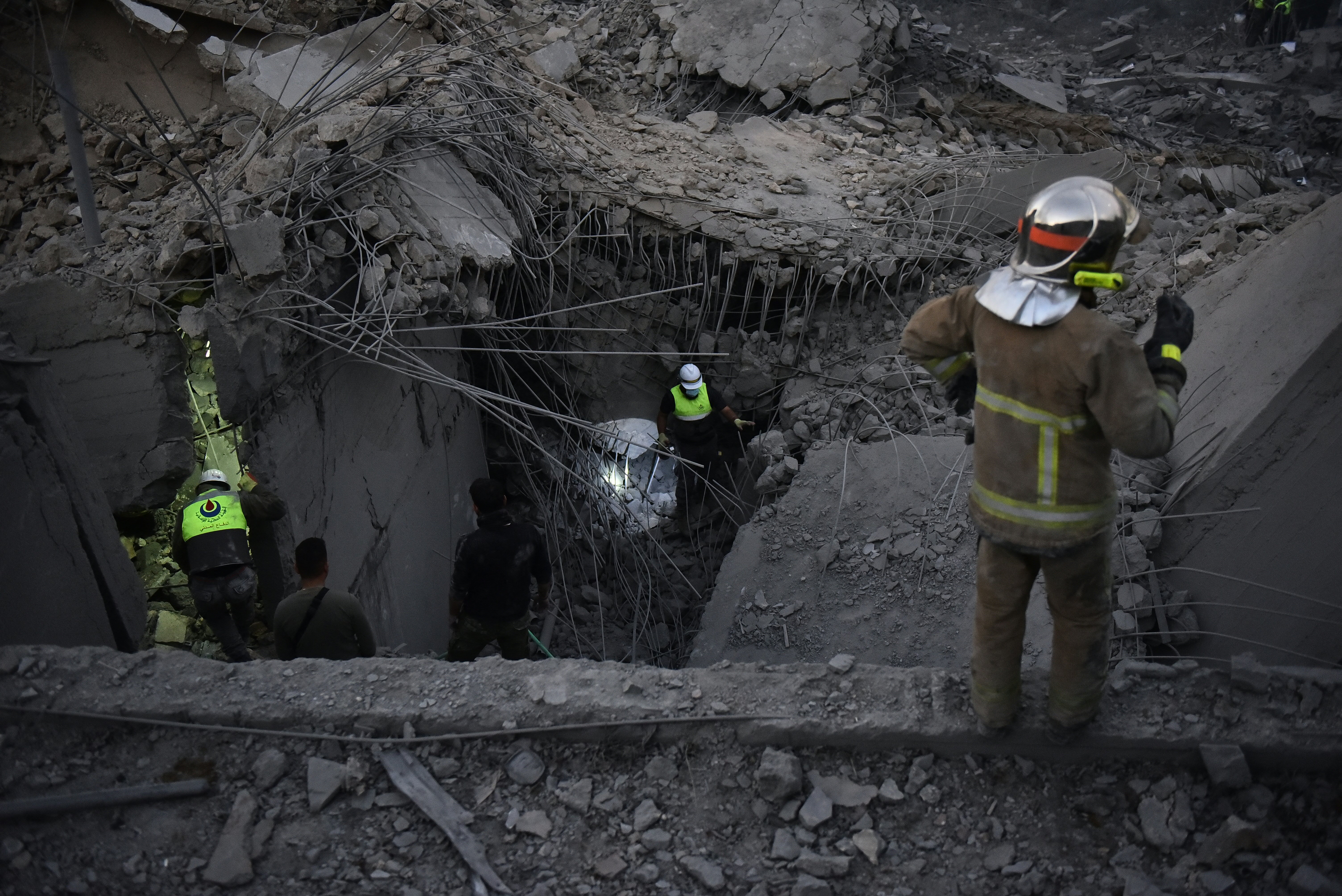 Rescue teams looks for survivors at the site of an Israeli airstrike that targeted a house where displaced people lived in the village of Baalshmay in the Lebanese mountains. Photo / AFP