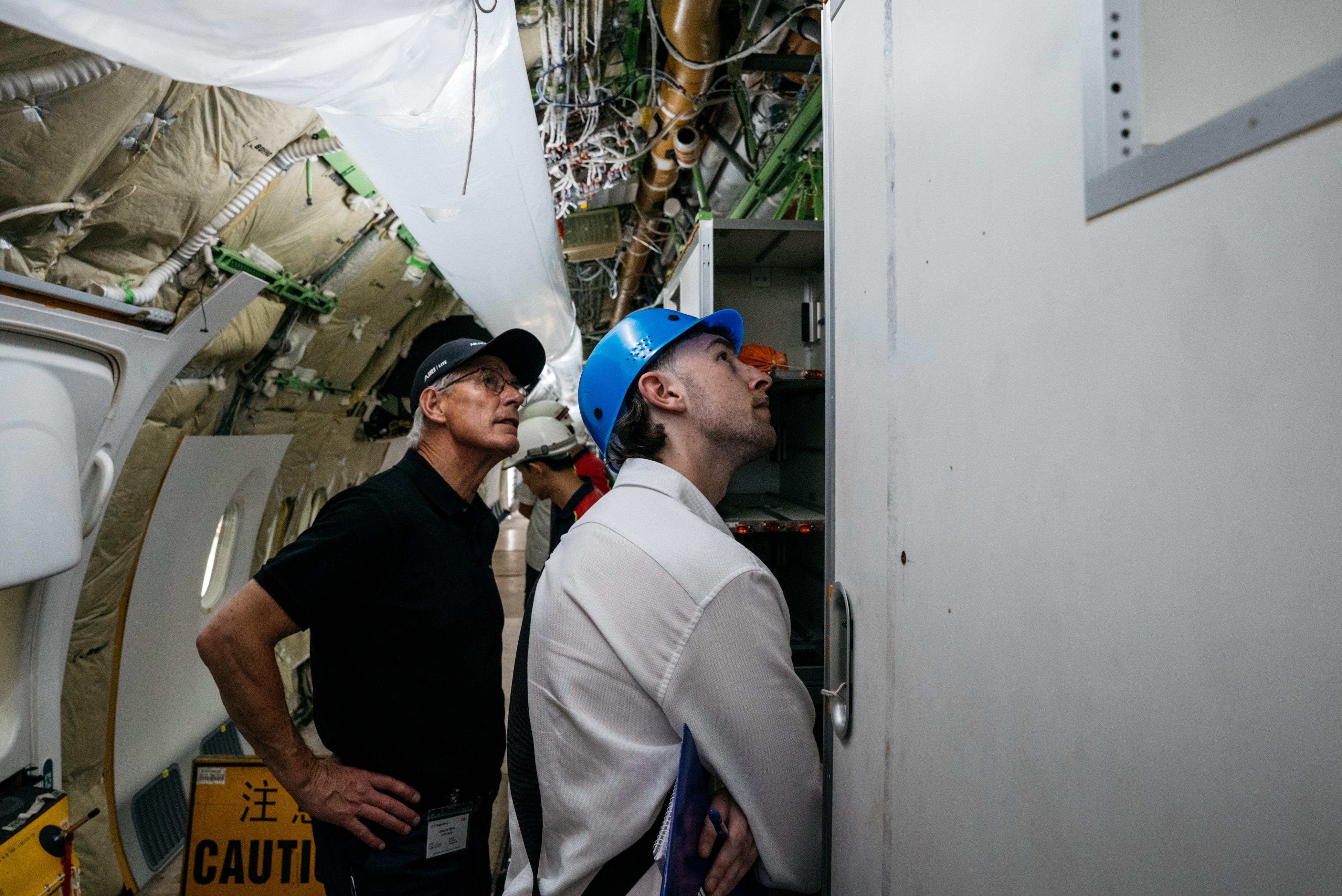 Air New Zealand chief executive Greg Foran on board the first of the airline's Boeing 787-9 Dreamliner's being retrofitted at ST Engineering's facility in Singapore, December 3 2024. Photo / Air New Zealand, Alex Twentyman