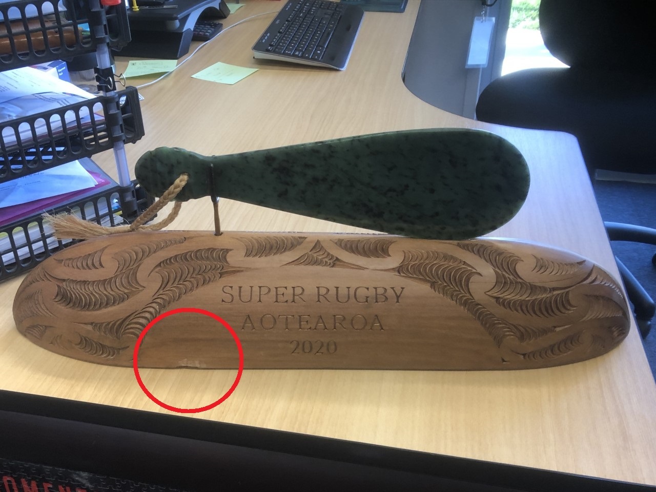 The Super Rugby trophy with damage to bottom left. Photo / Supplied
