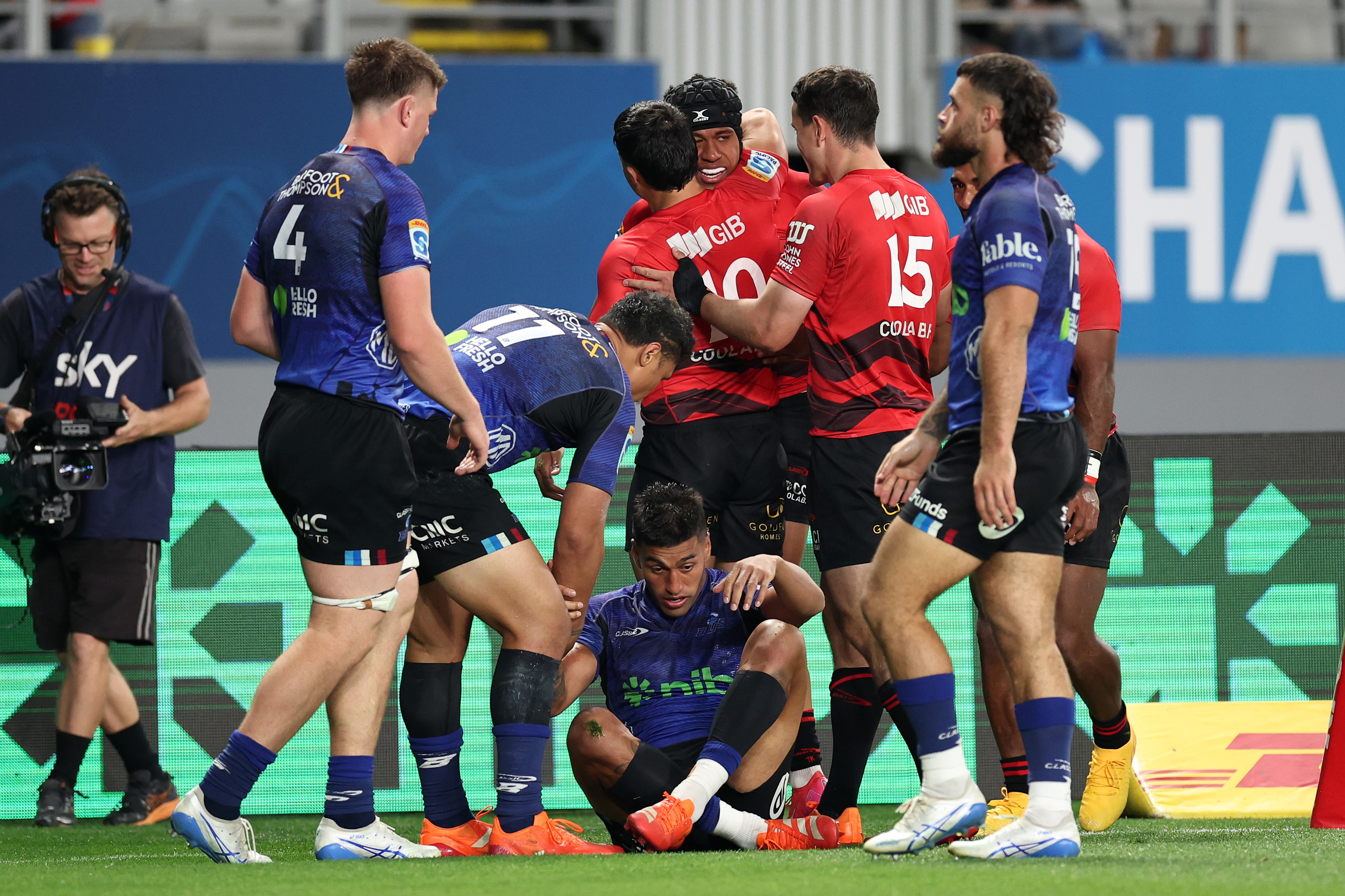 The Crusaders celebrate a try for Chay Fihaki against the Blues. Photo / Getty Images