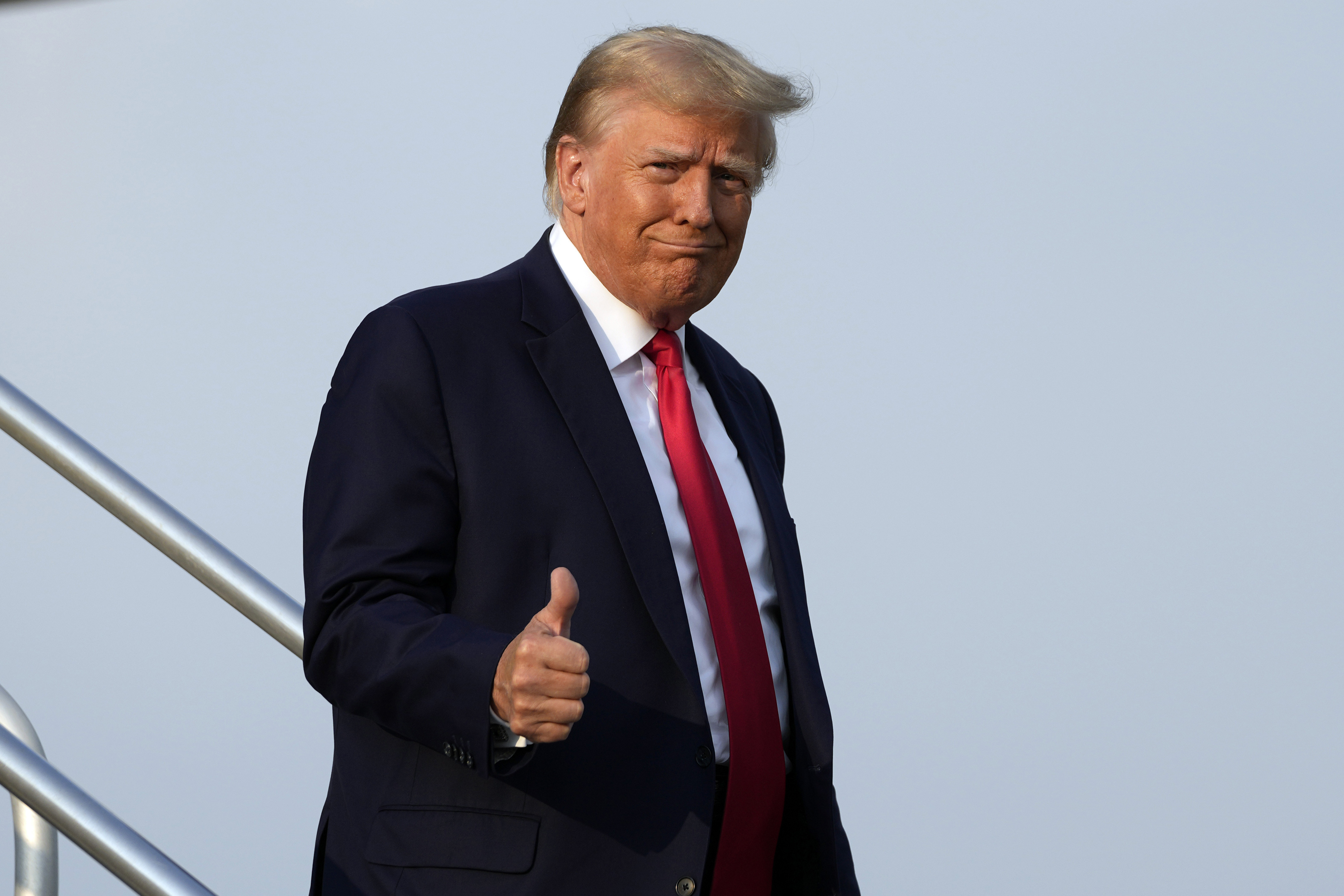 Former US President Donald Trump steps off his plane as he arrives at Hartsfield-Jackson Atlanta International Airport, Thursday, August 24, 2023, in Atlanta, headed to Fulton County Jail. Photo / AP