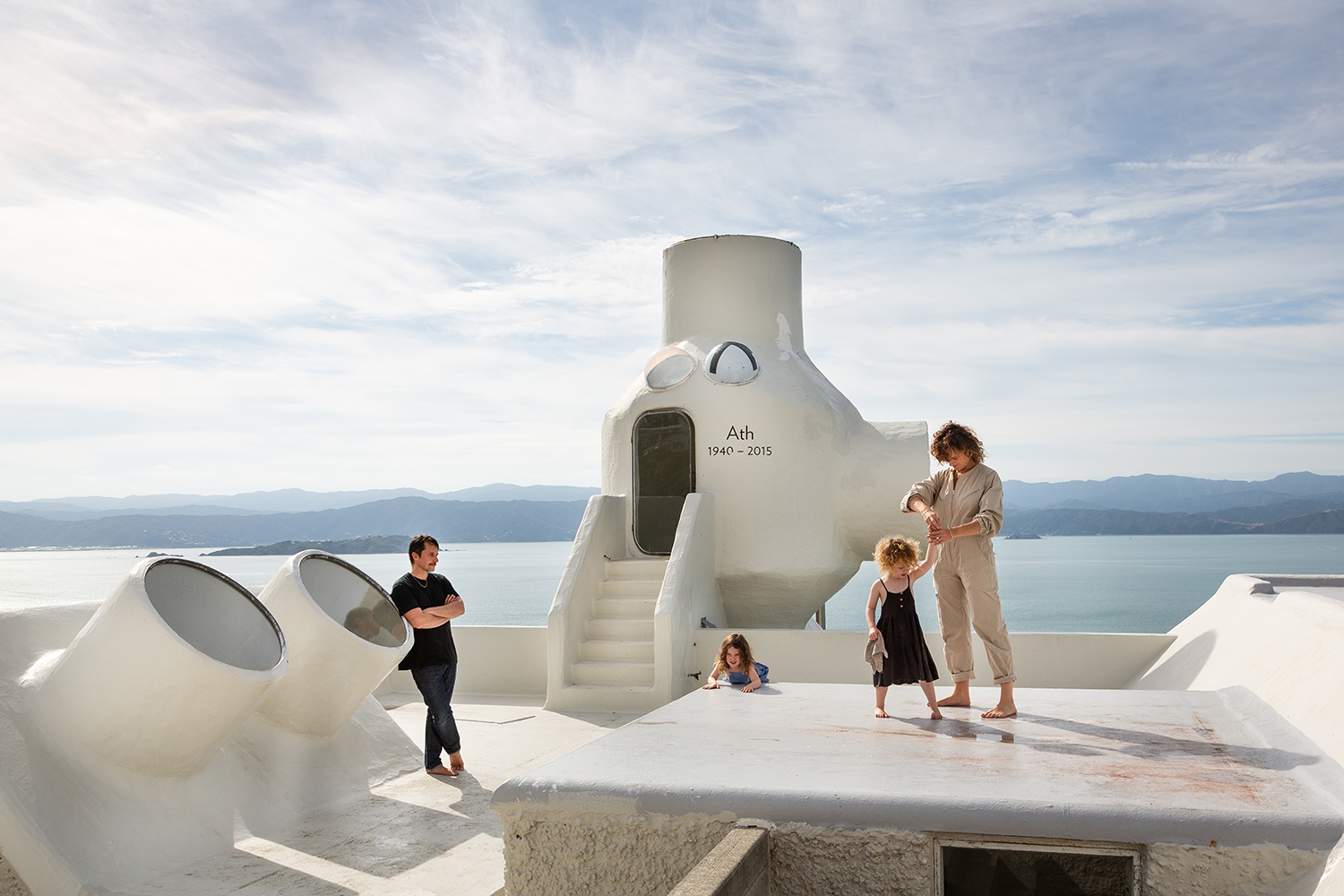Martin Basher, Martha Jeffries and their 3-year-old twins spend a lot of time on the roof with its built-in slide and incredible view. Photo / Paul McCredie