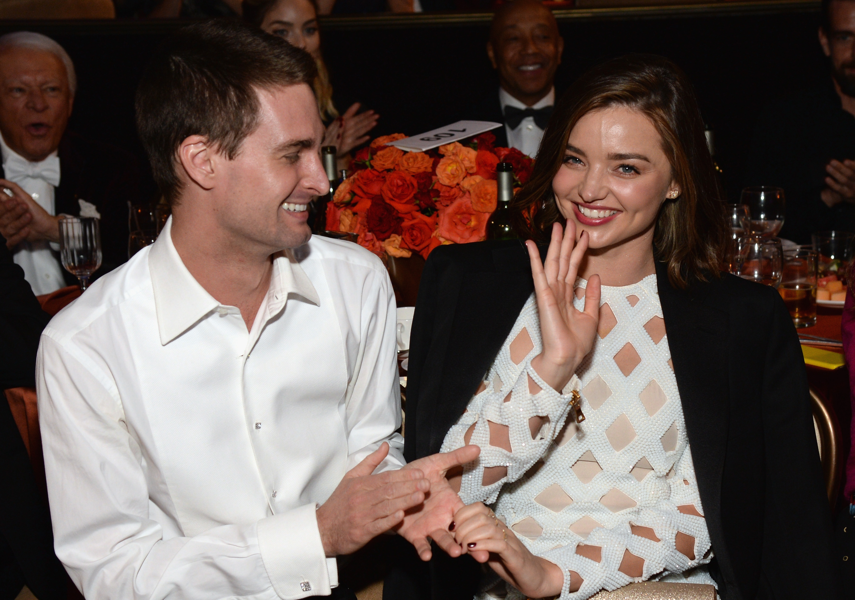 Co-founder of Snapchat Evan Spiegel (L) and model Miranda Kerr. Photo / Getty