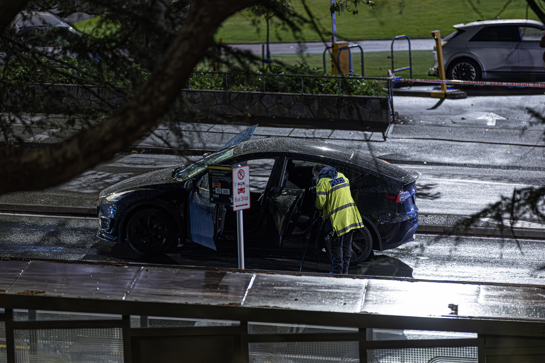 Police at the scene on Wellesley Street. Photo / Hayden Woodward.