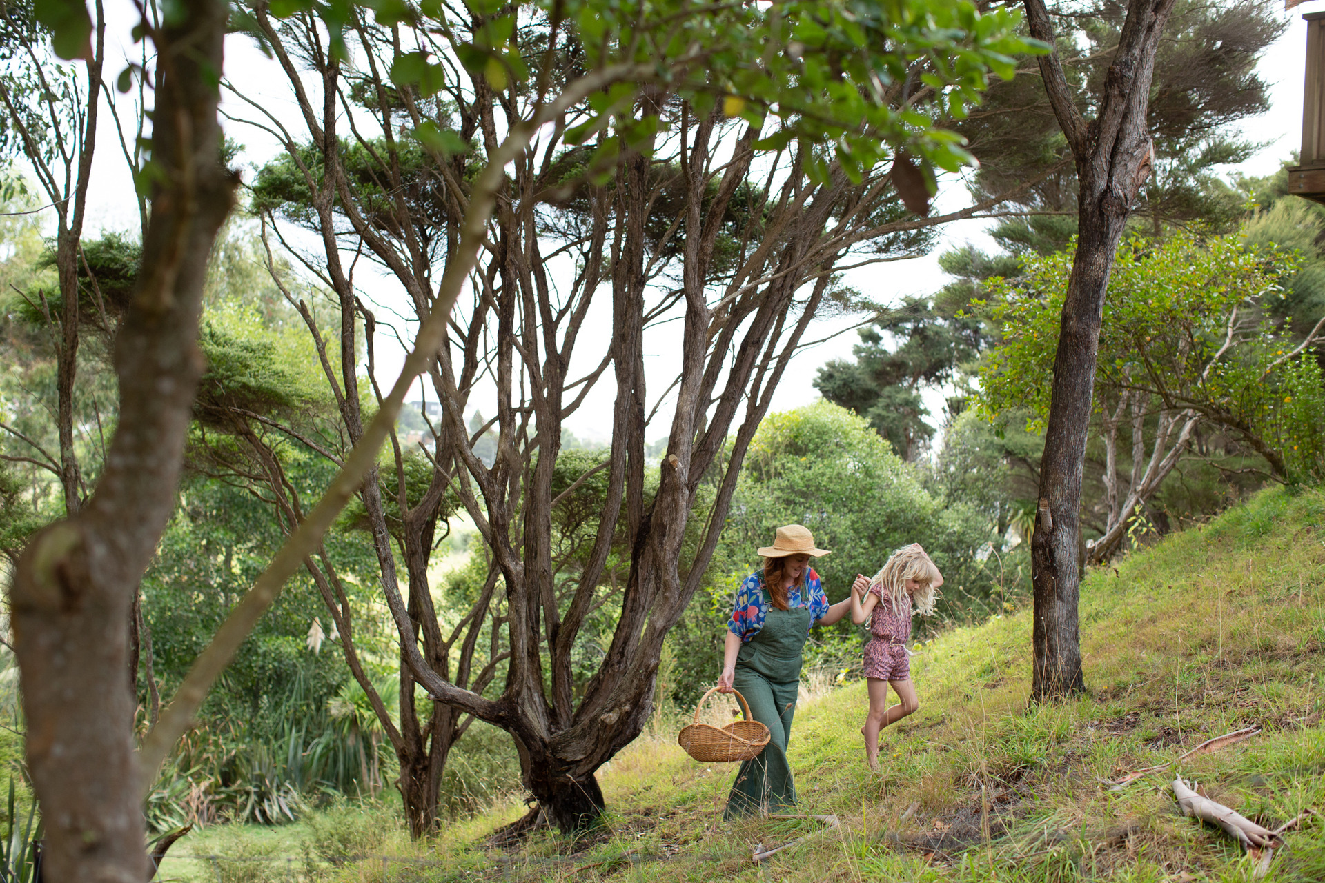 Feijoa foraging in Raglan with Indi. Photo / Lottie Hedley