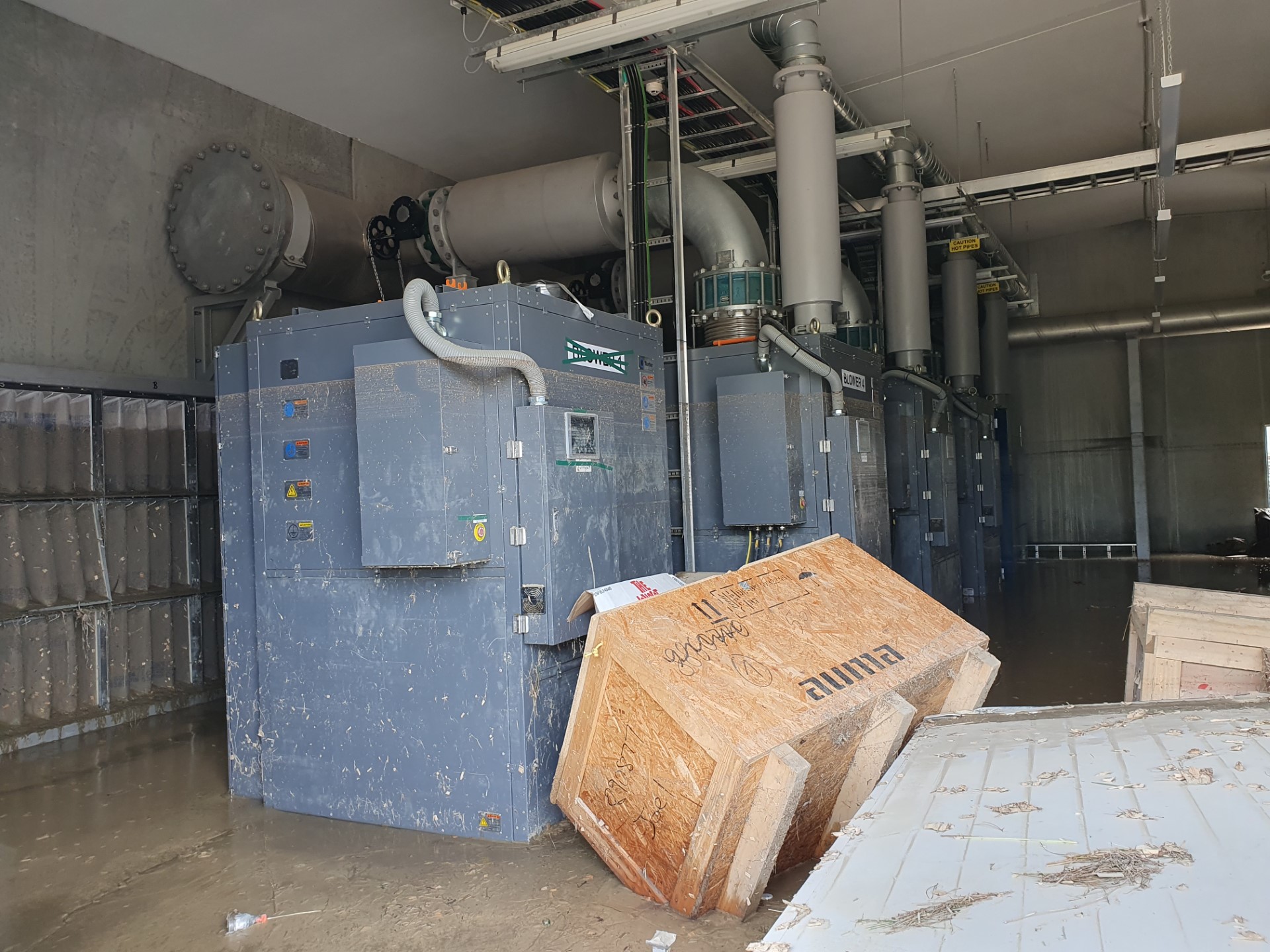 The flood aftermath inside one of Pan Pac's electrical rooms, showing how high the floodwaters reached.