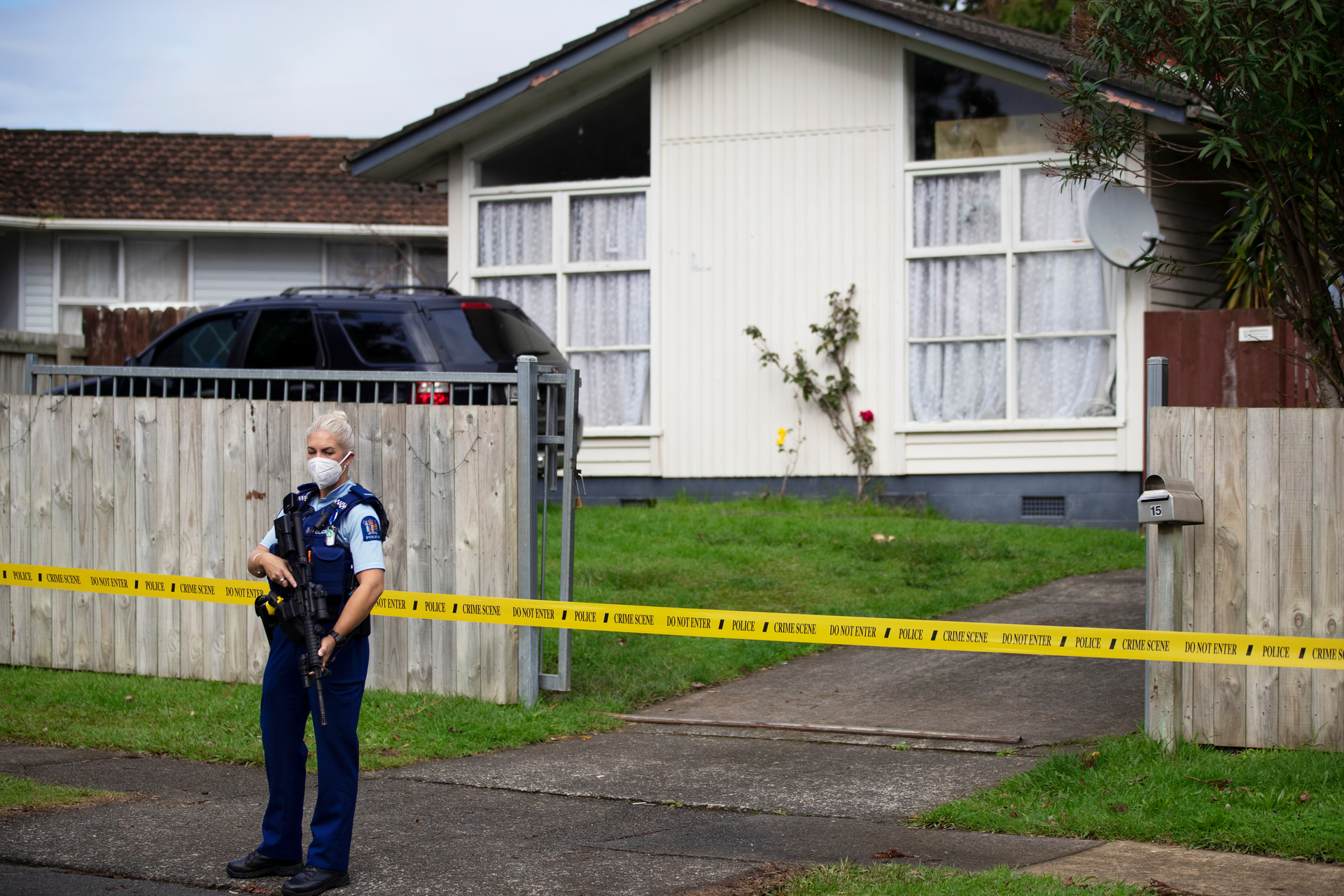 A Clover Park home under police guard after a shooting in the past fortnight. Photo / Hayden Woodward
