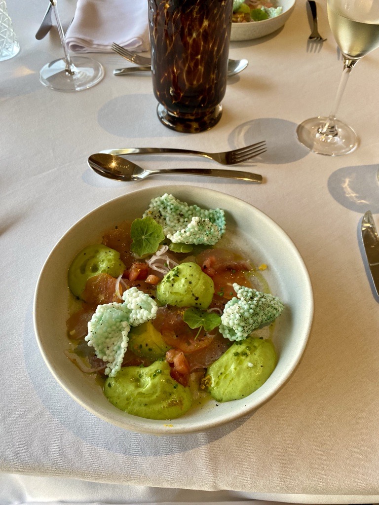 Kingfish sashimi with bright green pea espuma at Delamore Lodge. Photo / Johanna Thornton