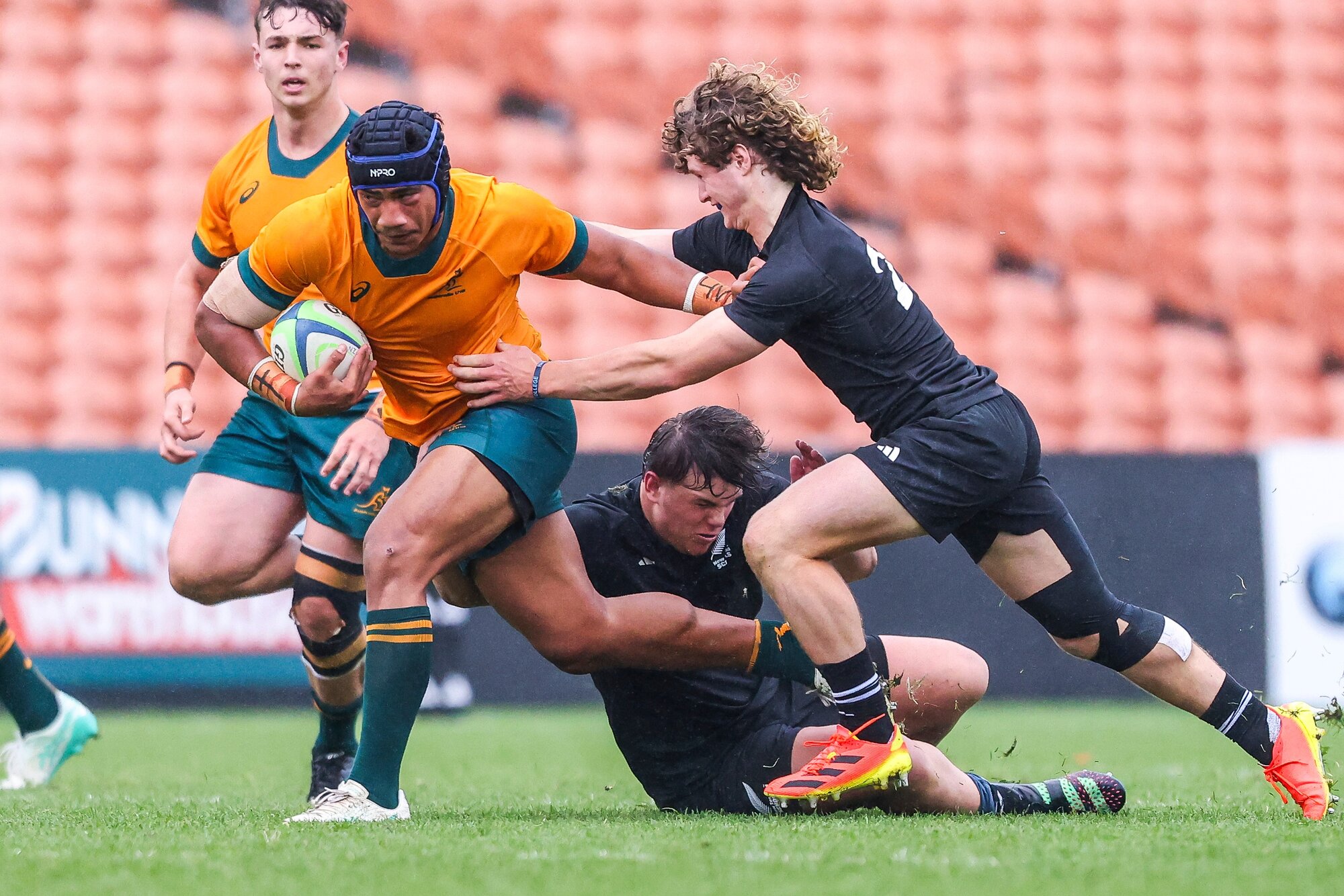 Australia Under-18s' Heinz Lemoto makes a charge against New Zealand Schools last year. Photo / Photosport