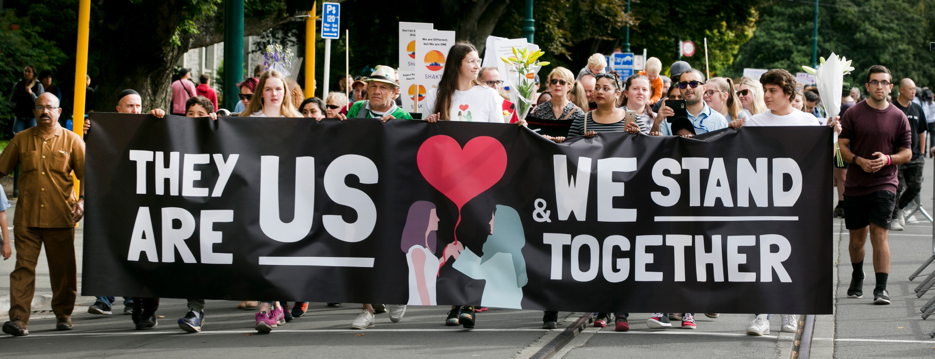Marchers express support for the Muslim community after the Christchurch terror attacks. Photo / NZ Herald