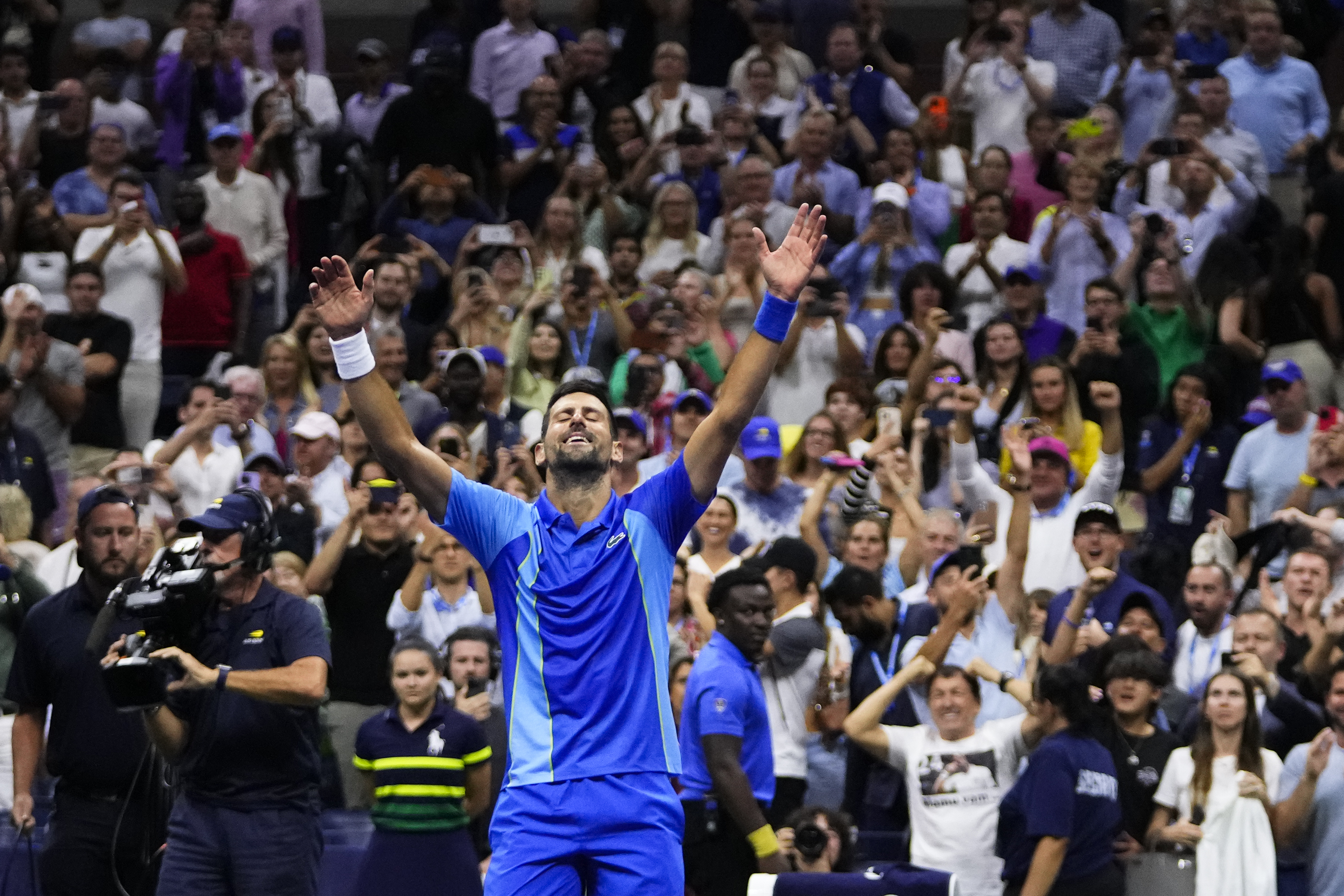 Novak Djokovic reacts after defeating Daniil Medvedev in the men's singles final of the US Open. Photo / AP