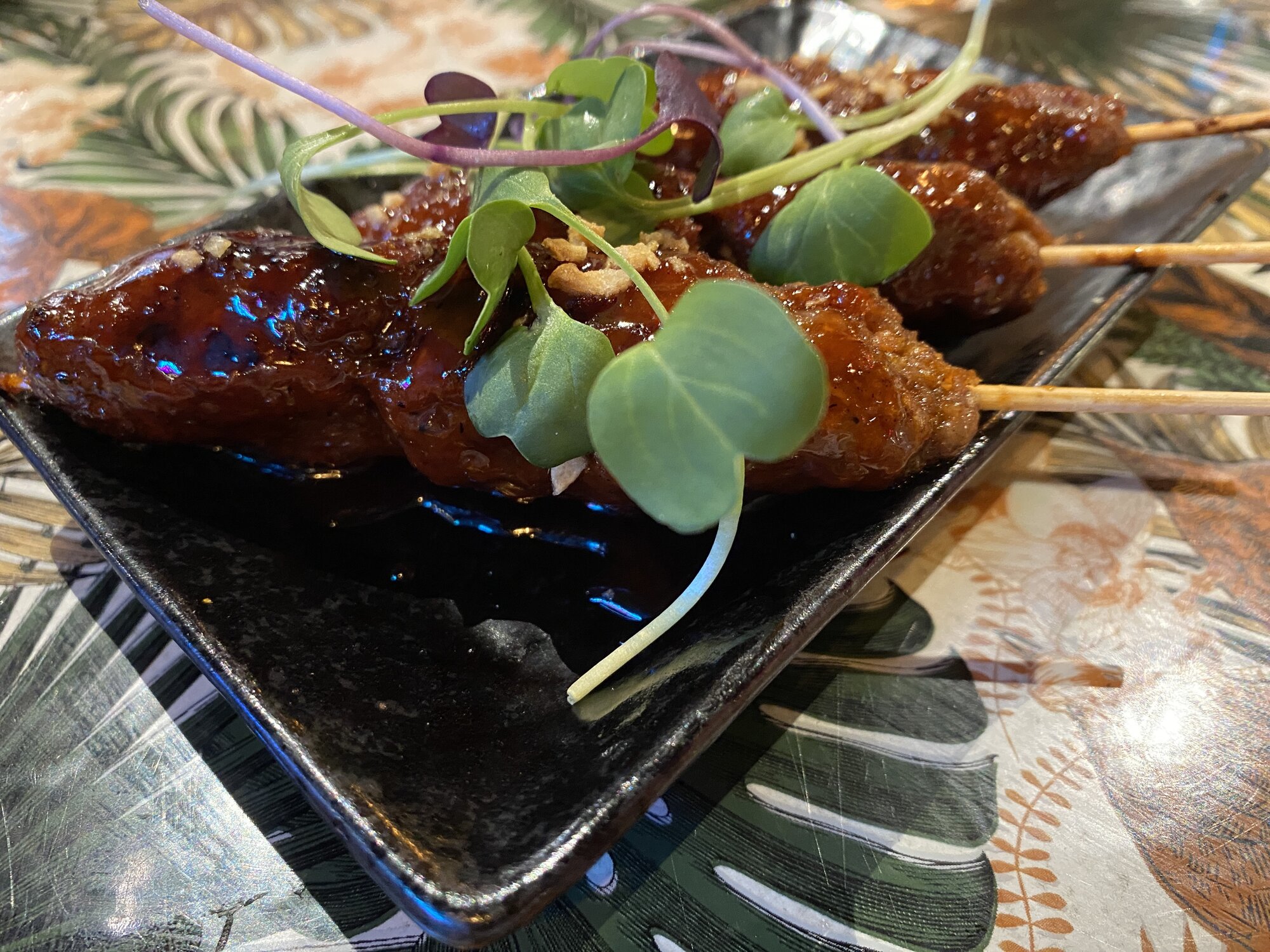 Hidden Village's lamb longanisa skewer. Photo / Kim Knight