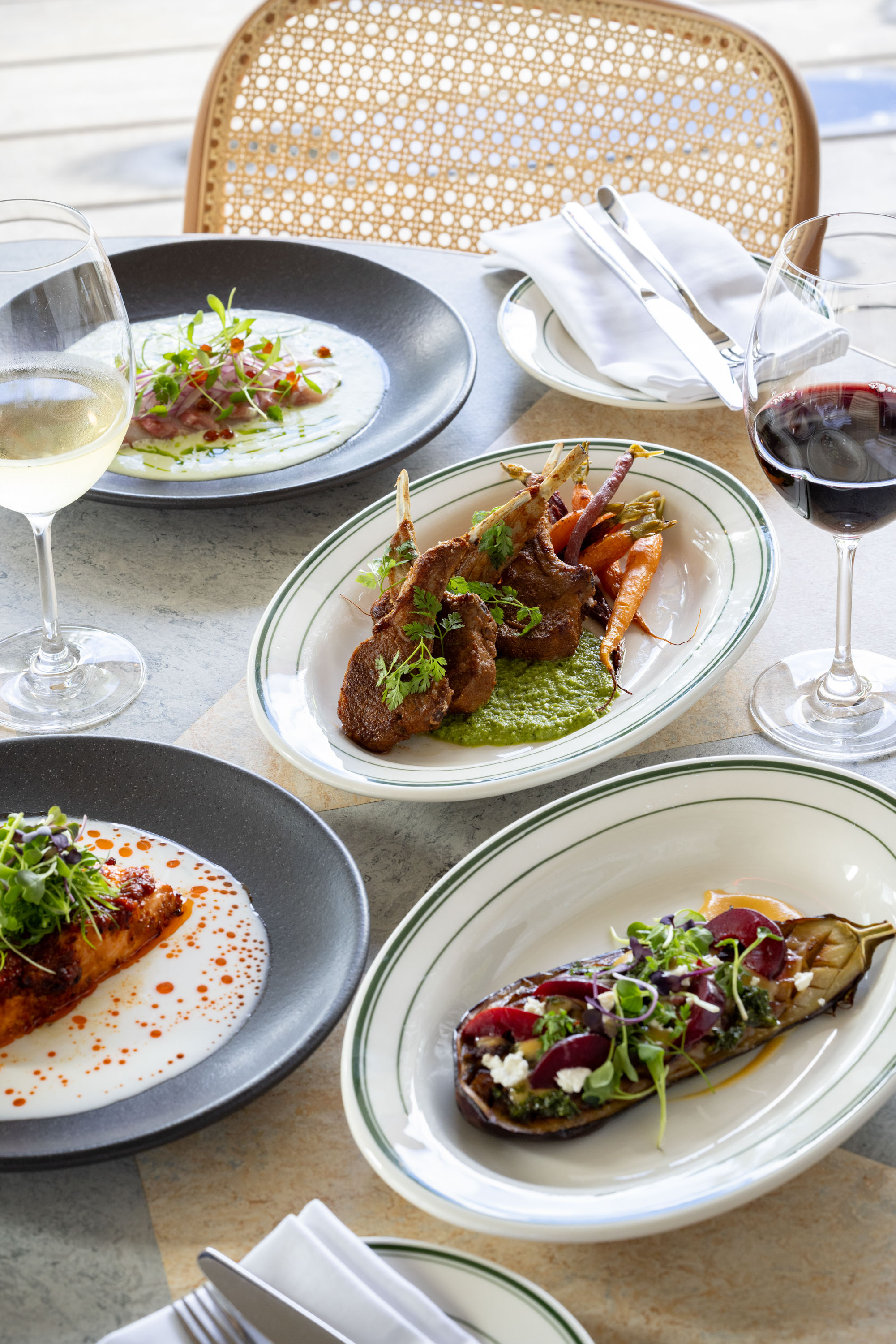 The lamb chops, spicy salmon, kingfish ceviche and eggplant on the menu at First Mates Last Laugh. Photo / Babiche Martens