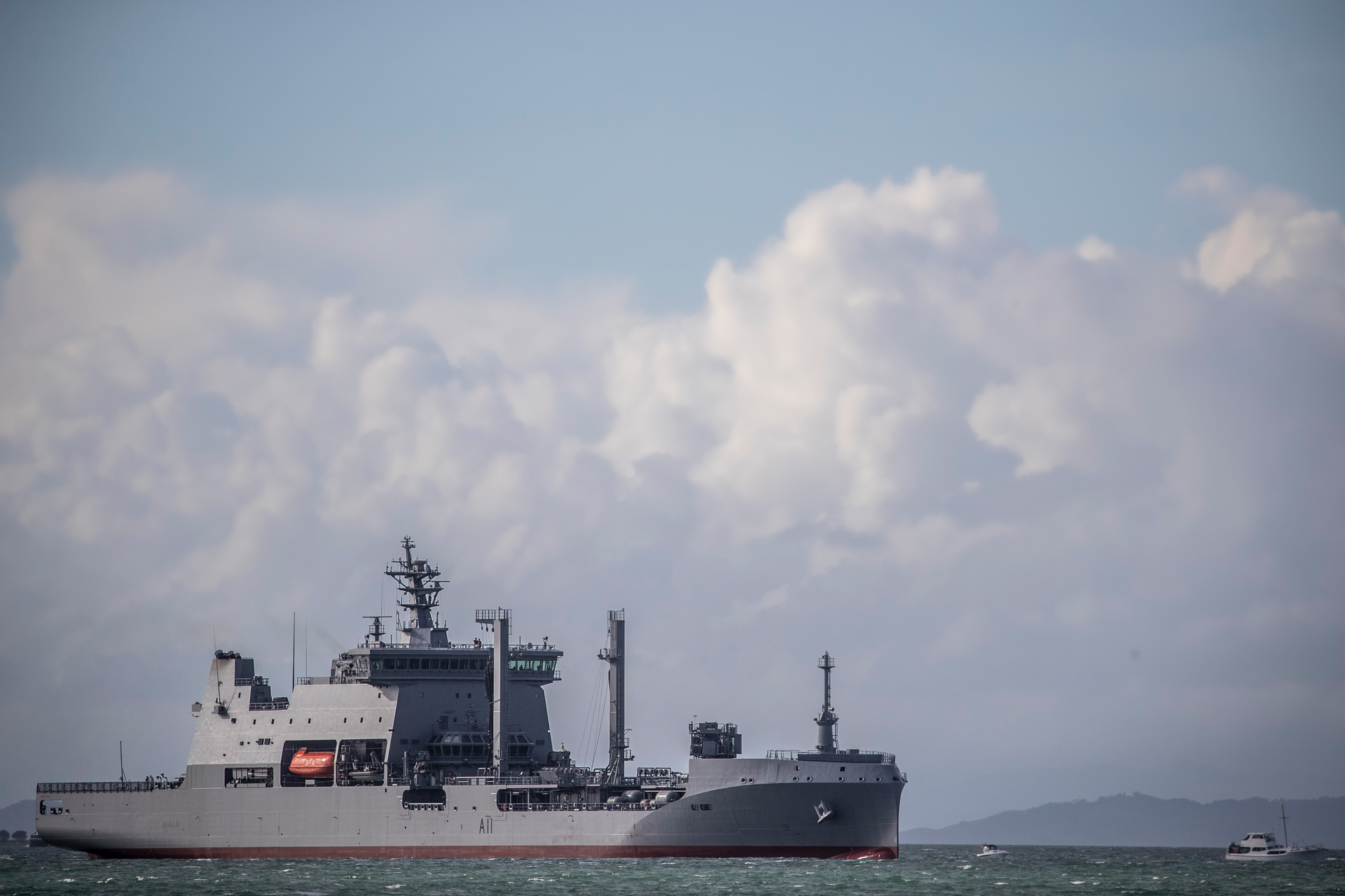 The Royal New Zealand Navy's largest ever ship, HMNZS Aotearoa, arriving into Devonport Naval Base. Photo / Michael Craig