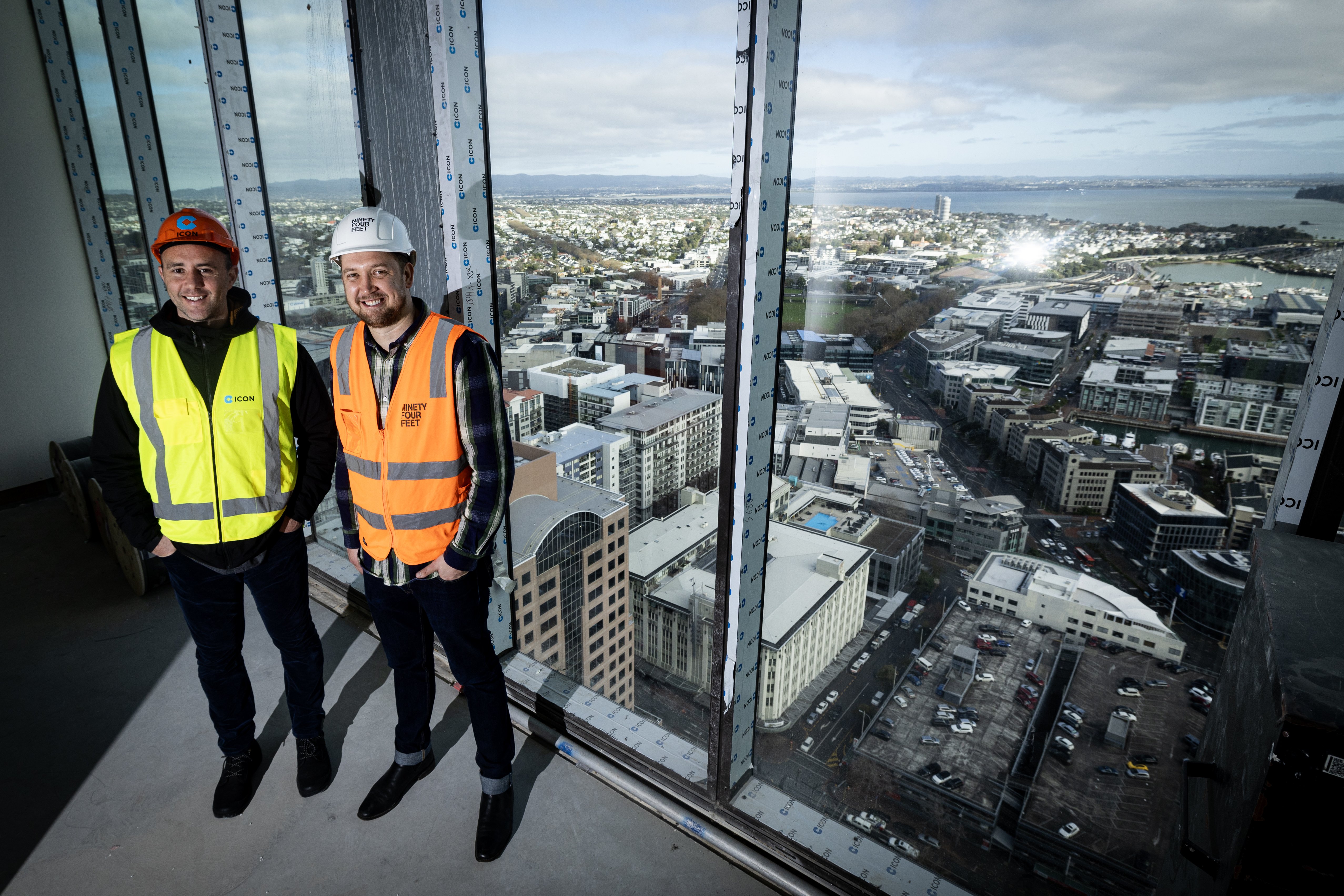 Dean Rzechta of Ninety-Four Feet and Hotel Indigo Auckland general manager Matt Simister on level 41 of the new tower. Photo / Jason Oxenham