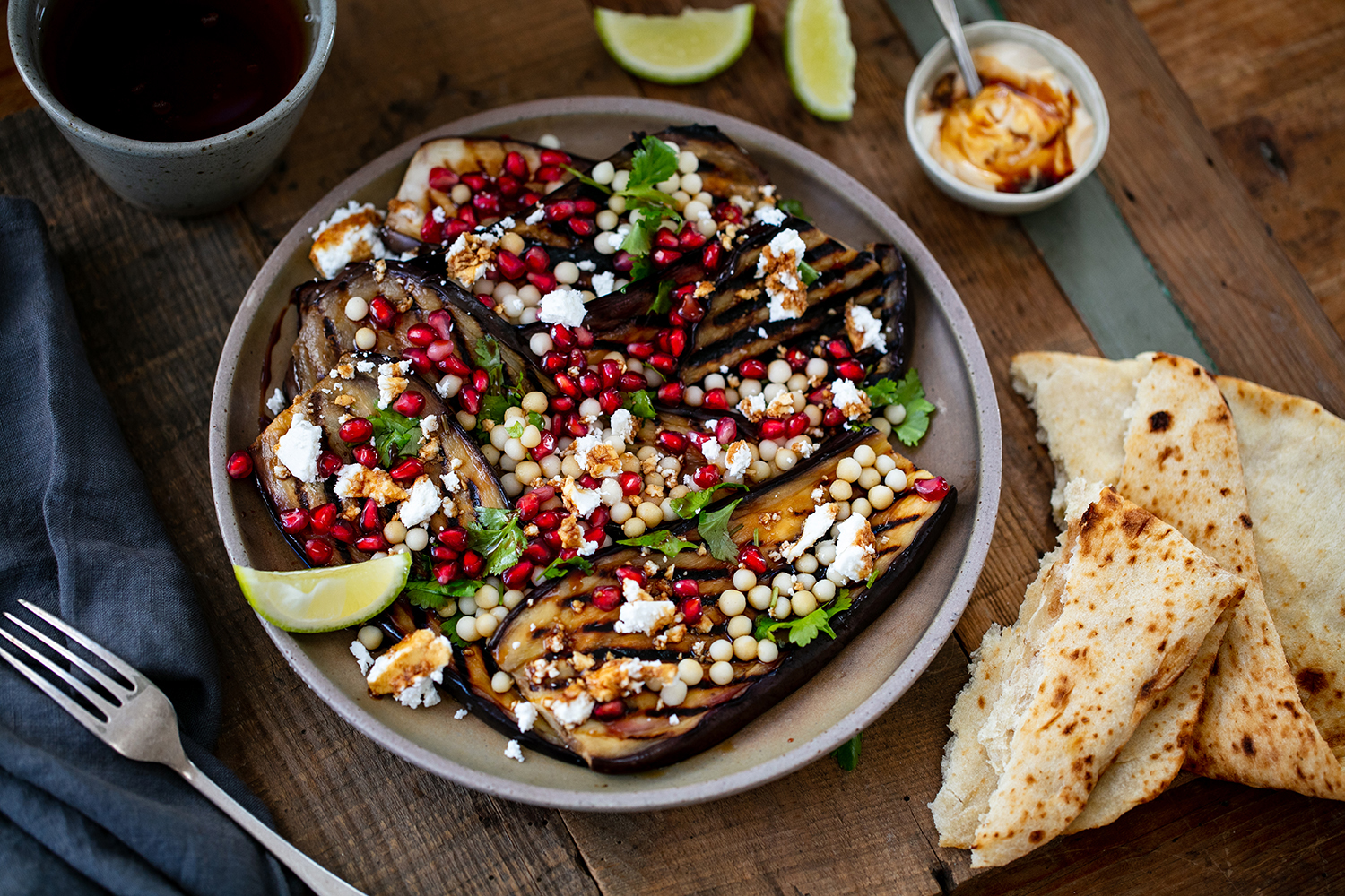 Aubergine, couscous and pomegranate salad. Photo / Babiche Martens