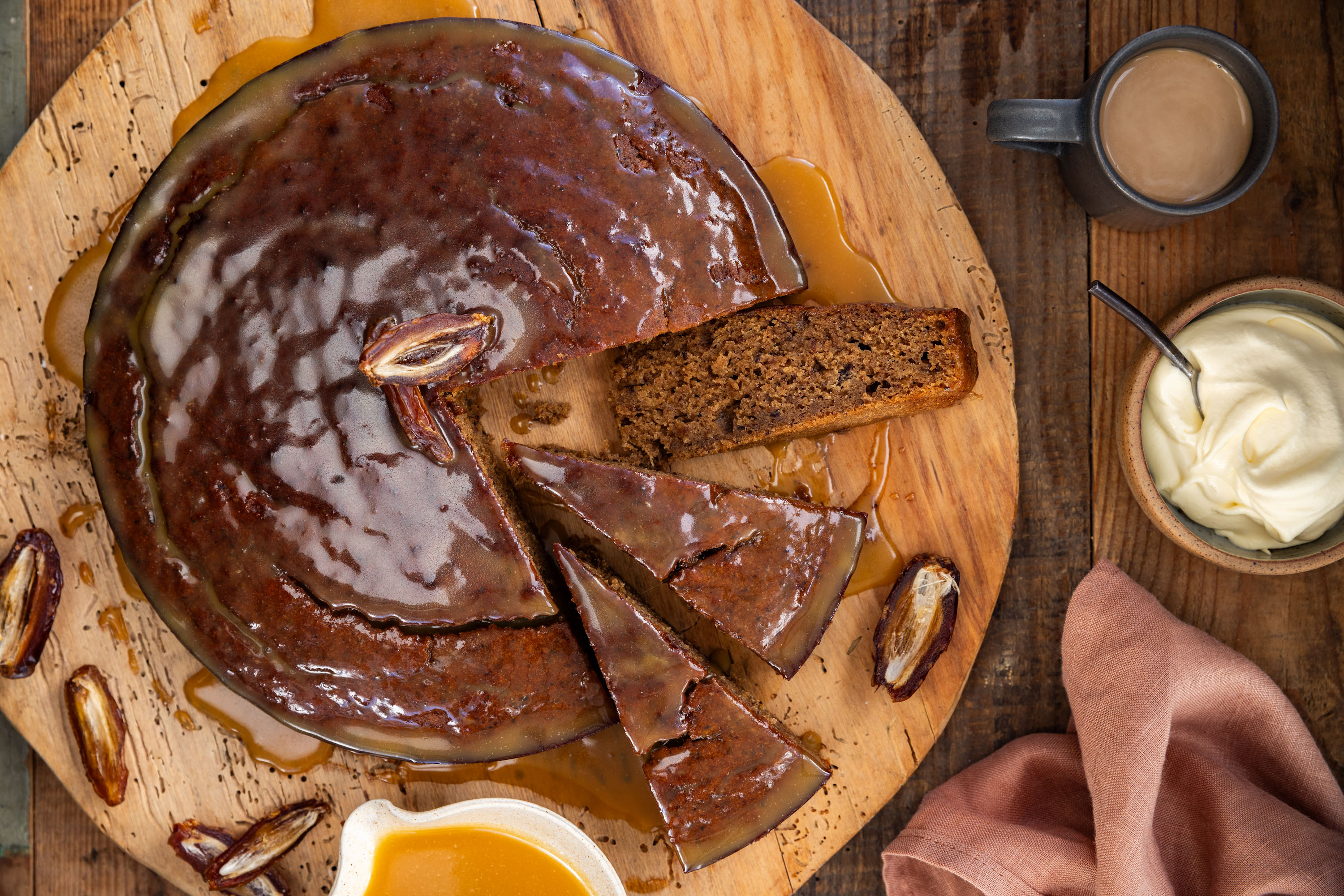 Garnish this sticky, gingery cake with an array of fresh dates. Photo / Babiche Martens