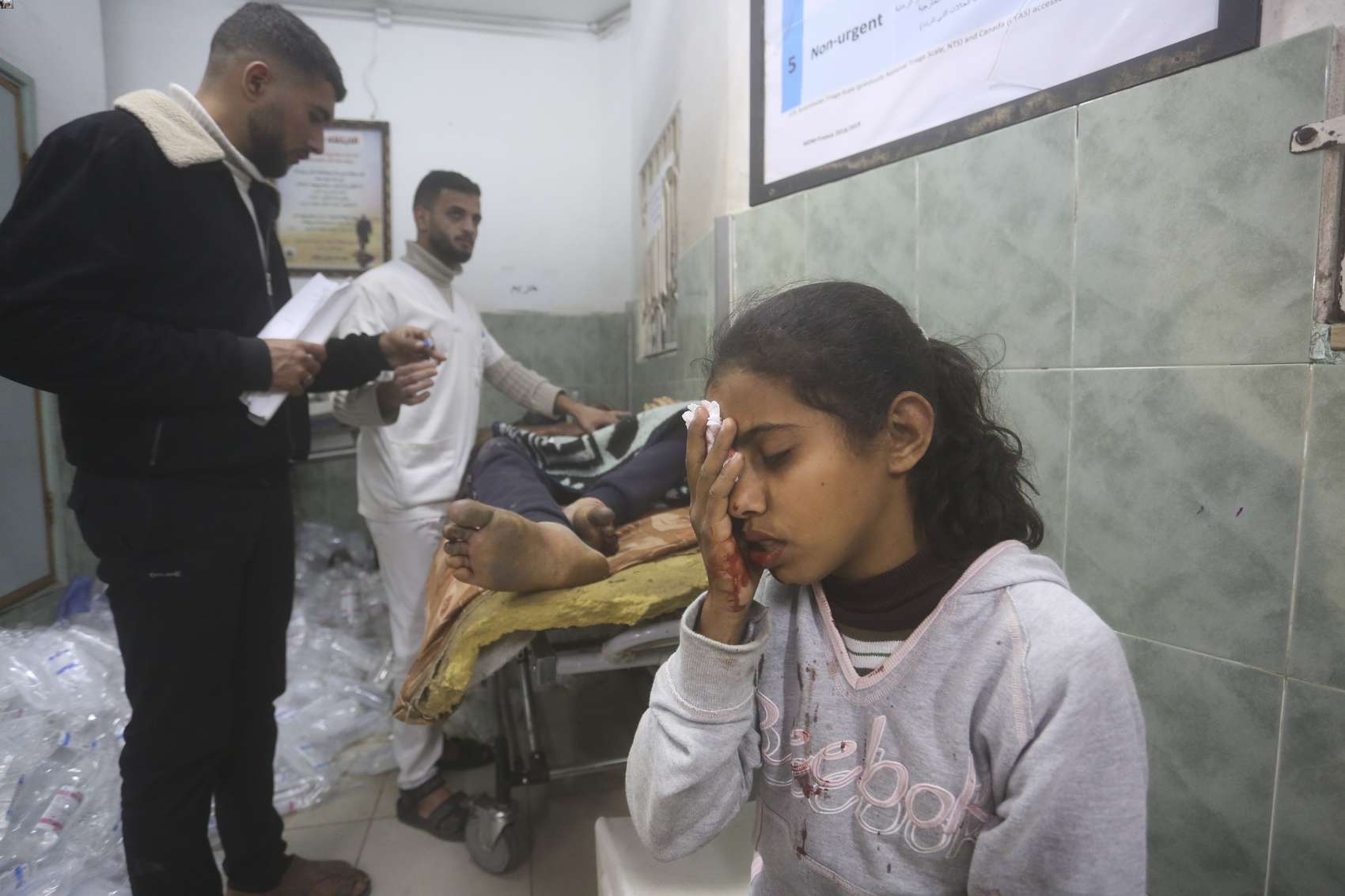 Injured Palestinians receive treatment at a hospital in Rafah, a town where many of them are crammed following Israeli evacuation orders that cover two-thirds of Gaza. Photo / AP