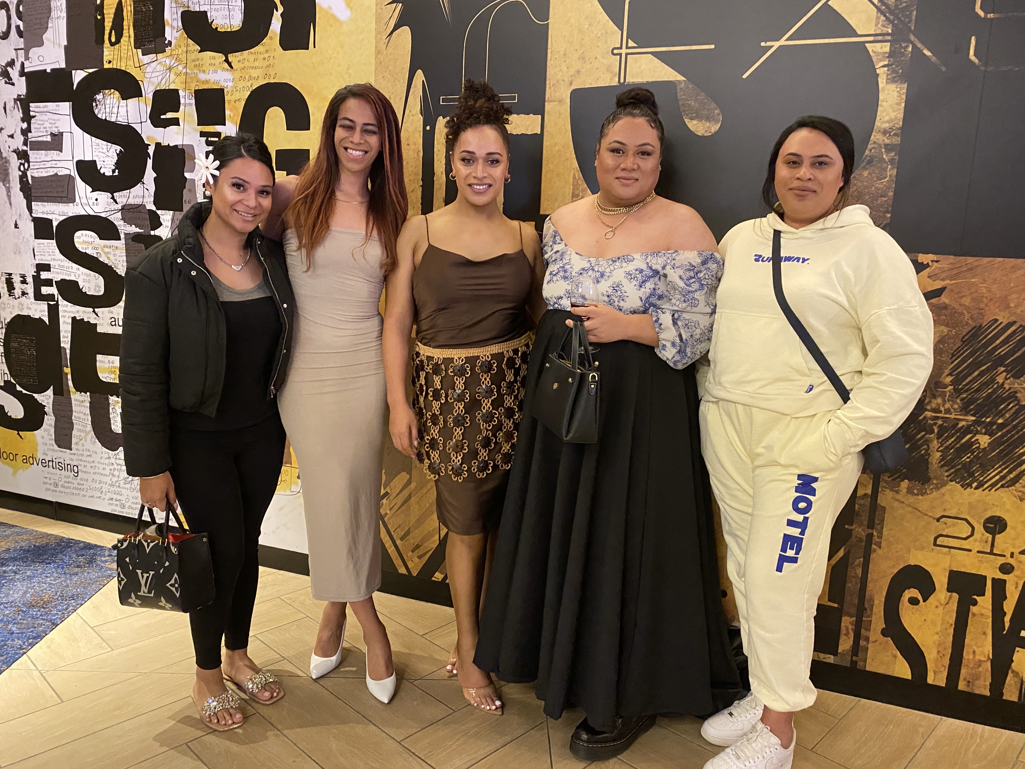 Amanaki Prescott-Faletau (middle) pictured with friends, including those from the transgender community, at a special screening of new film Inky Pinky Ponky. Photo / Grace Fiavaai
