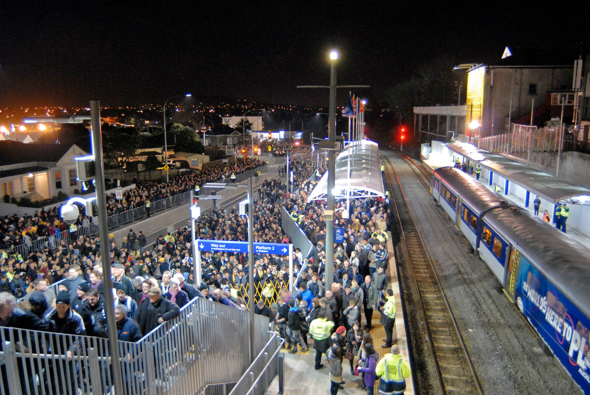 Some of this crowd after a rugby test at Eden Park are waiting for a train, the rest are trying to get somewhere else. But they all have to use the same area. Photo / Michael Craig

