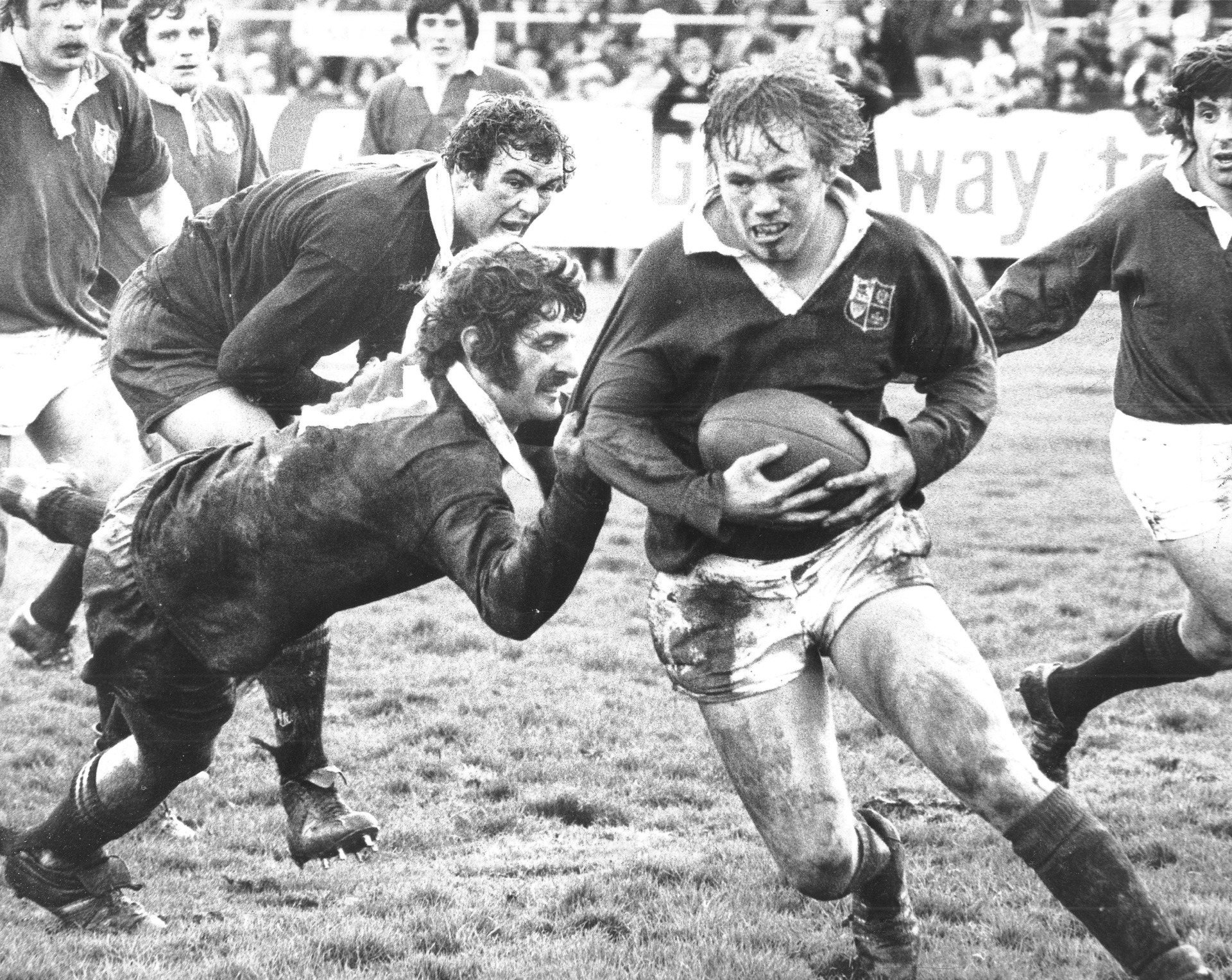 Graham Mourie has hooker Peter Wheeler by the jersey, as Andy Haden looks on during the 1977 Lions tour to New Zealand. Photo / NZ Herald