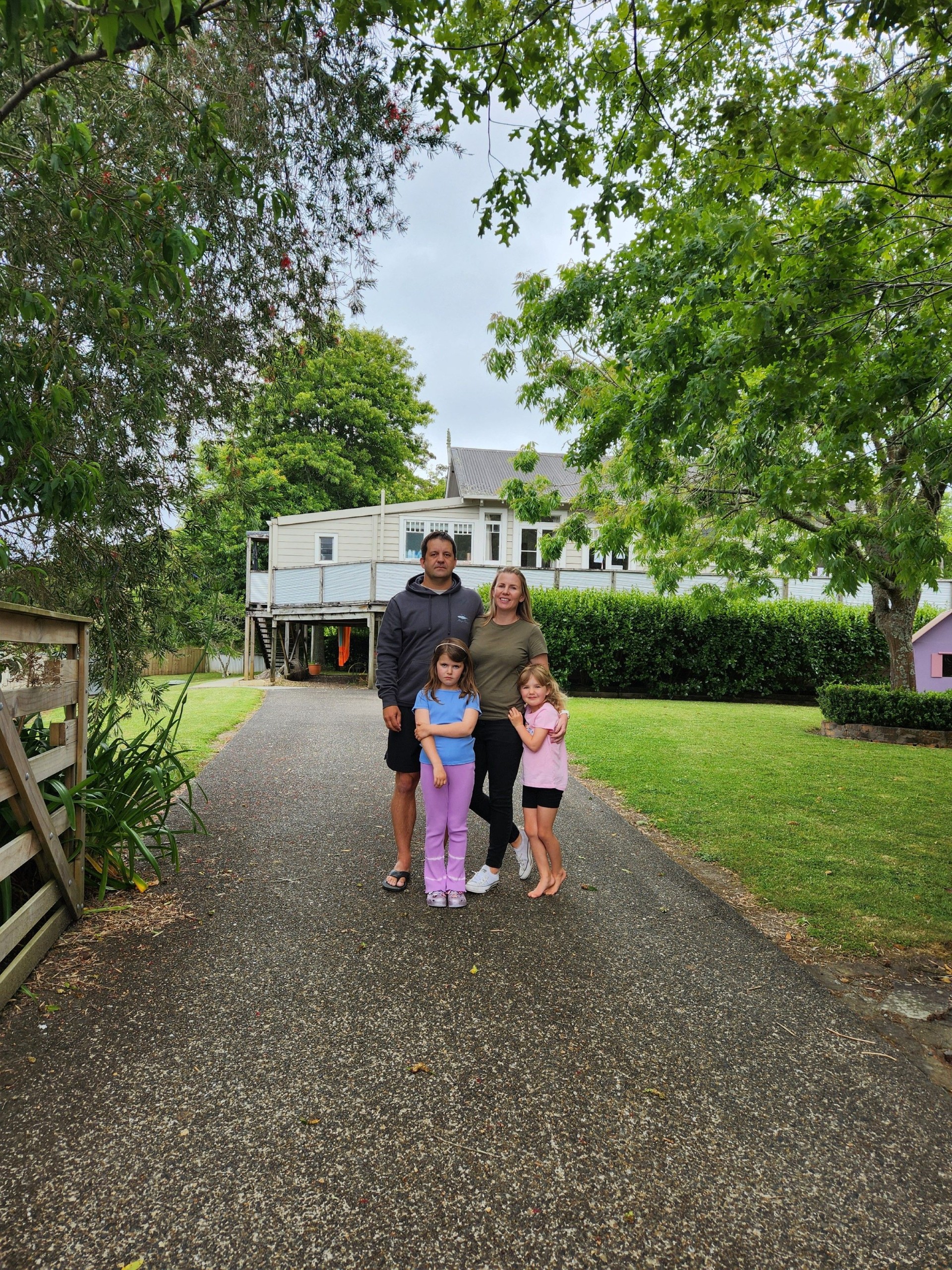 Stephanie and Brendon Deacon and their two children, aged 5 and 7.