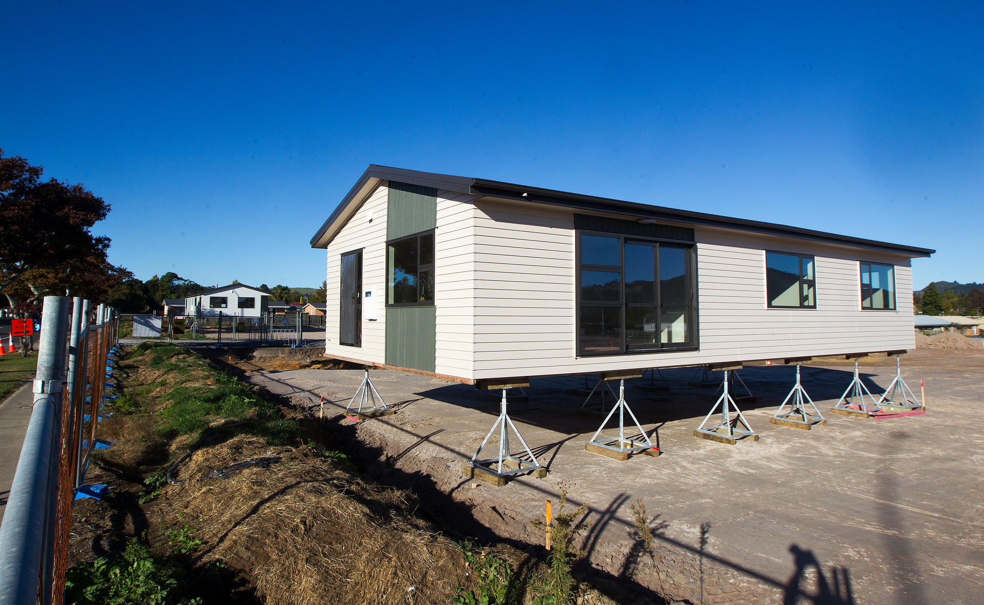 The first two houses arrived at the site Thursday morning. Photo / Ben Fraser