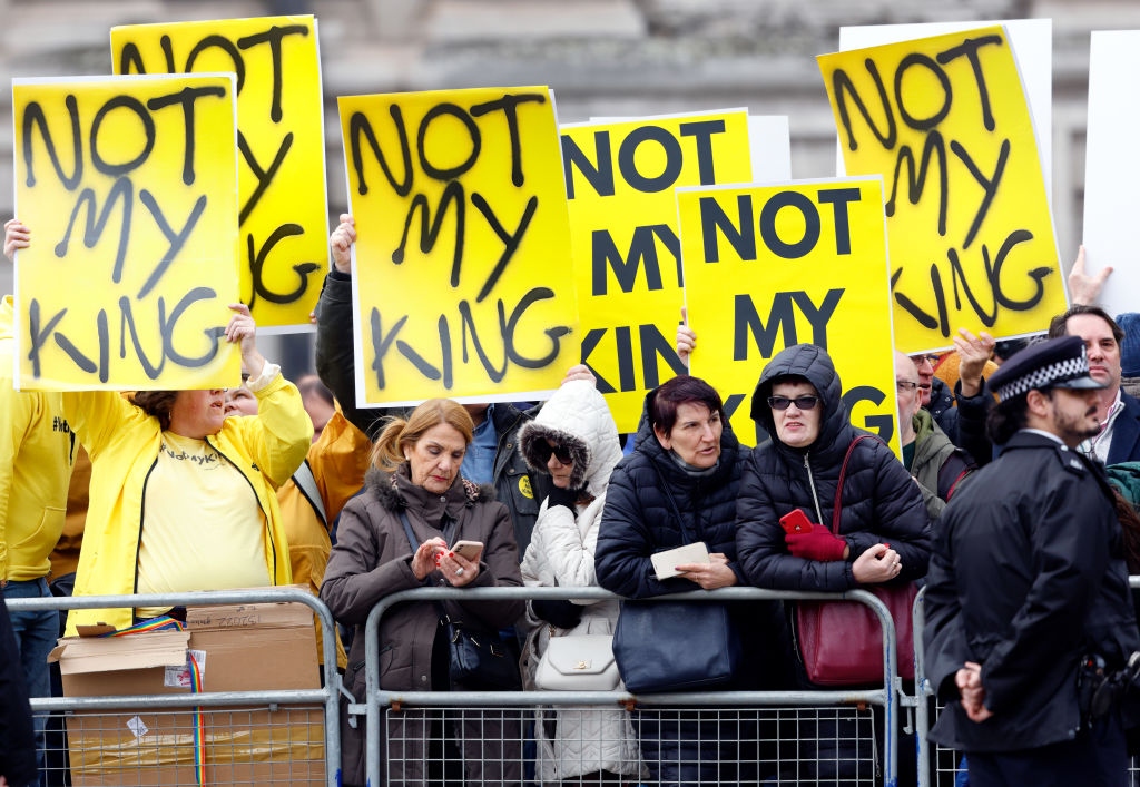 Anti-monarchy protesters from the pressure group Republic wave 