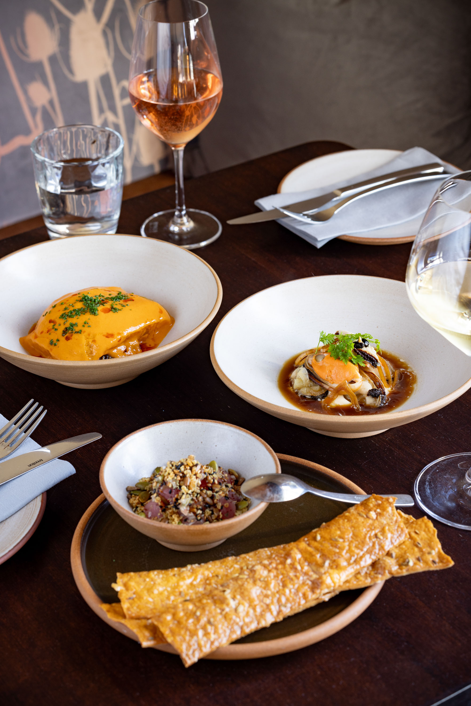 Wellington wine bar Rosella’s steamed butterfish, pickled mussels and tuna crudo with housemade seeded crackers. Photo / Babiche Martens