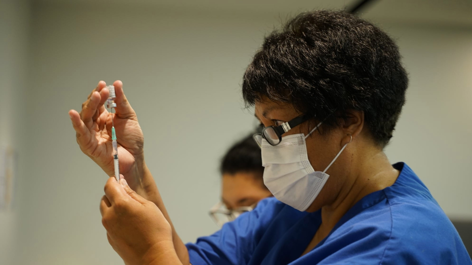 A nurse readies a syringe with the Pfizer BionTech Covid-19 vaccine. Photo / Ministry of Health