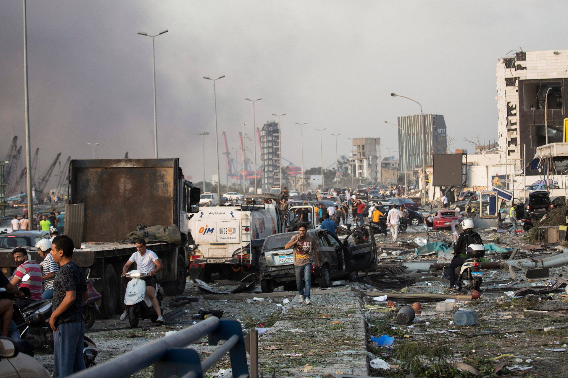 People evacuate the wounded after the massive explosion demolished large parts of Beirut. Photo / AP