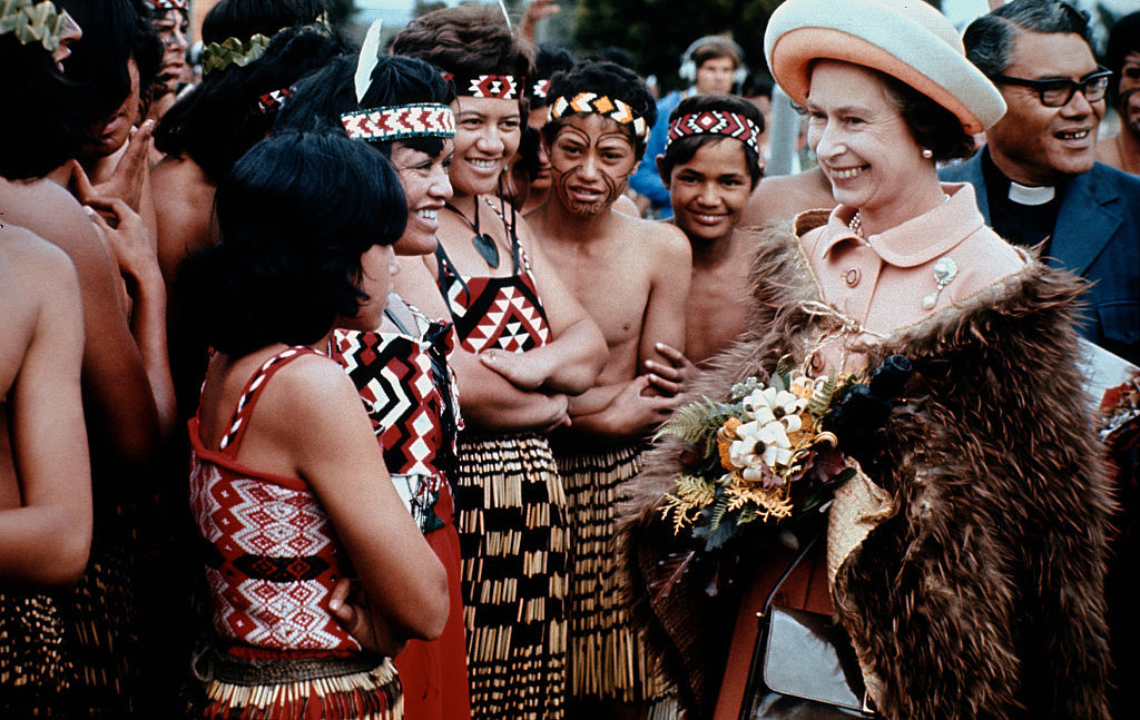 Queen Elizabeth II wears a korowai - a traditional Māori feather cloak as she is welcomed during her Silver Jubilee tour in 1977. Photo / Getty Images