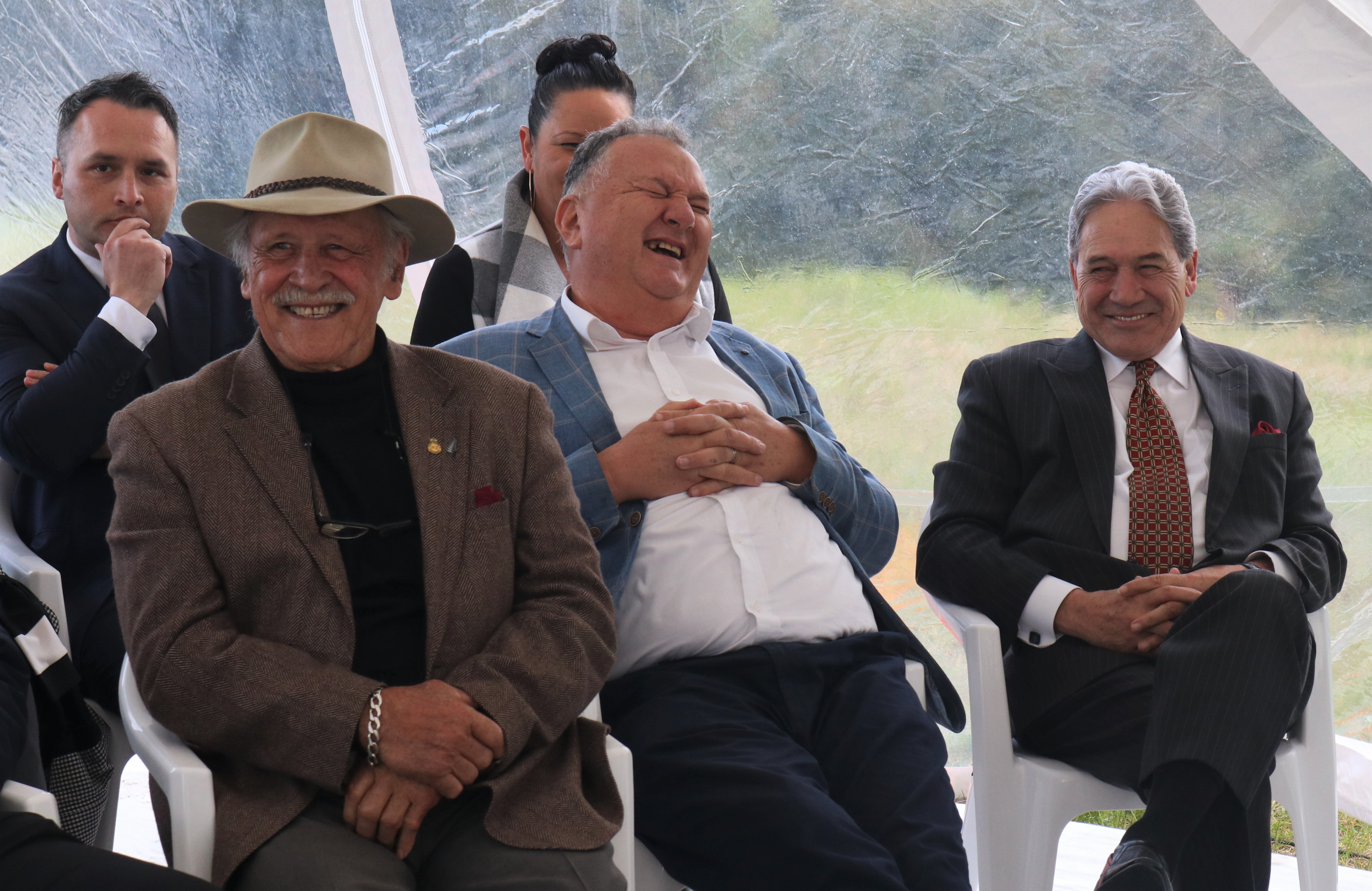 Te Tai Tokerau Water trustee Dover Samuels, former Regional Development Minister Shane Jones and New Zealand First leader Winston Peters react to Māori Development Minister Willie Jackson’s speech. Photo / Peter de Graaf